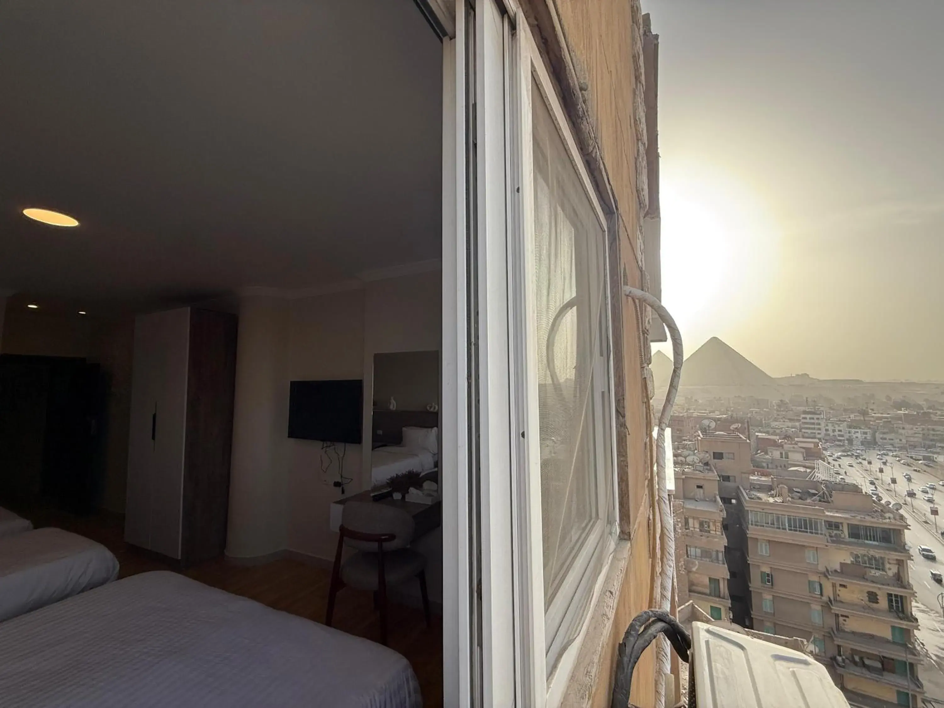 DELUXE DOUBLE ROOM TWIN BED CITY VIEW (BALCONY) in Eco green pyramids hotel DELUXE DOUBLE ROOM TWIN BED CITY VIEW (BALCONY) in Eco green pyramids hotel