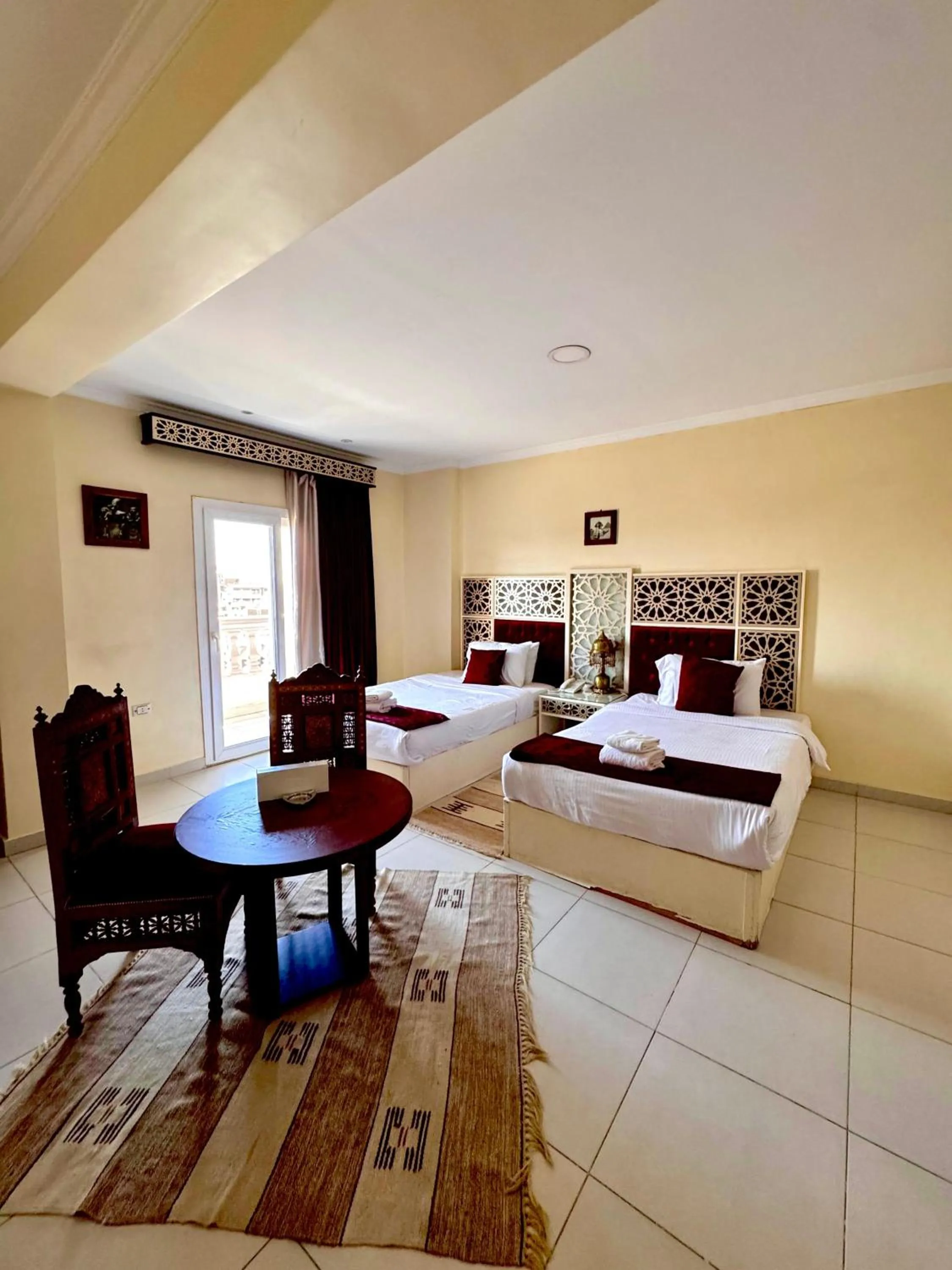 Bed in PYRAMIDS TOWER Inn