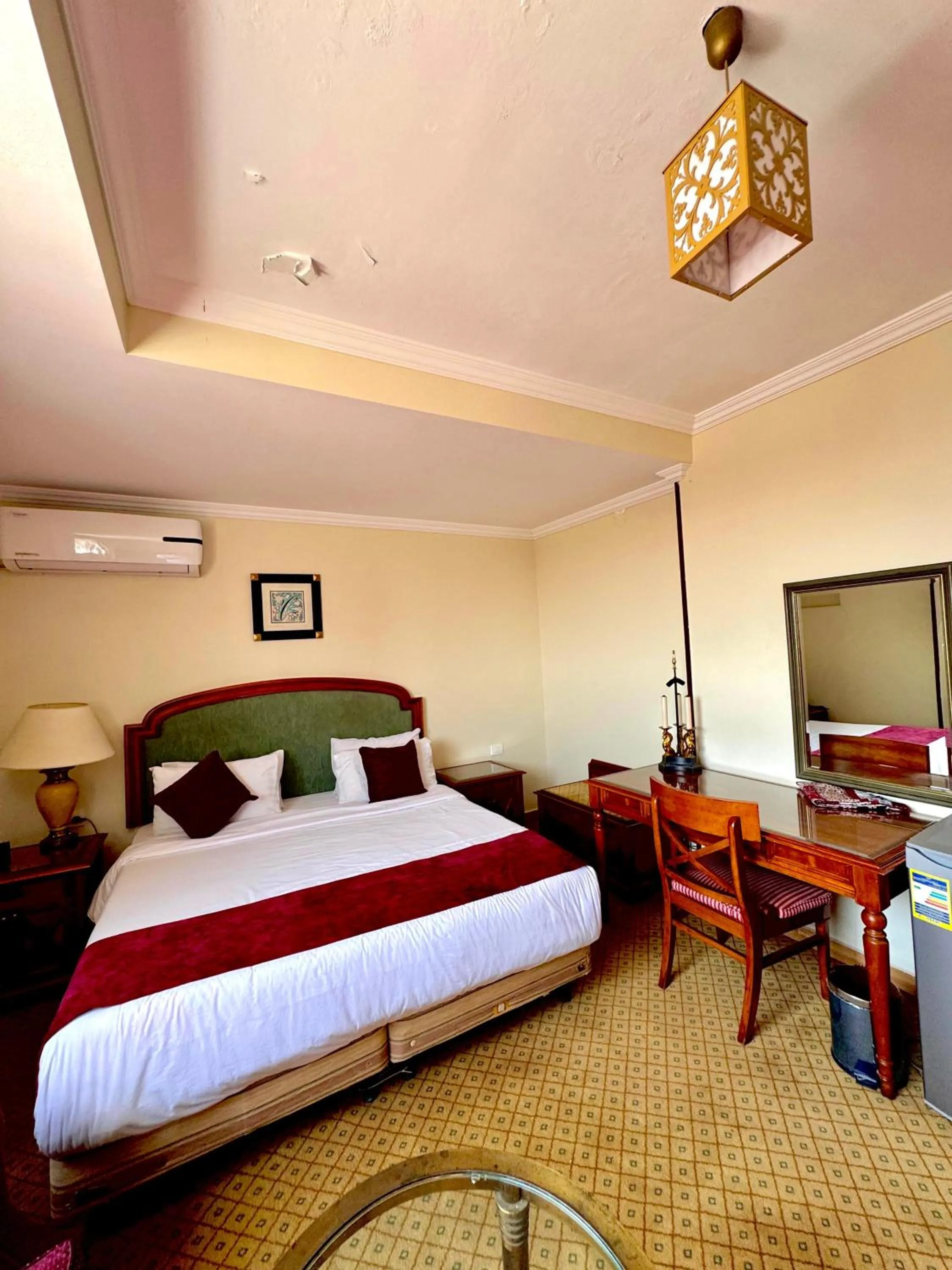 Bed in PYRAMIDS TOWER Inn