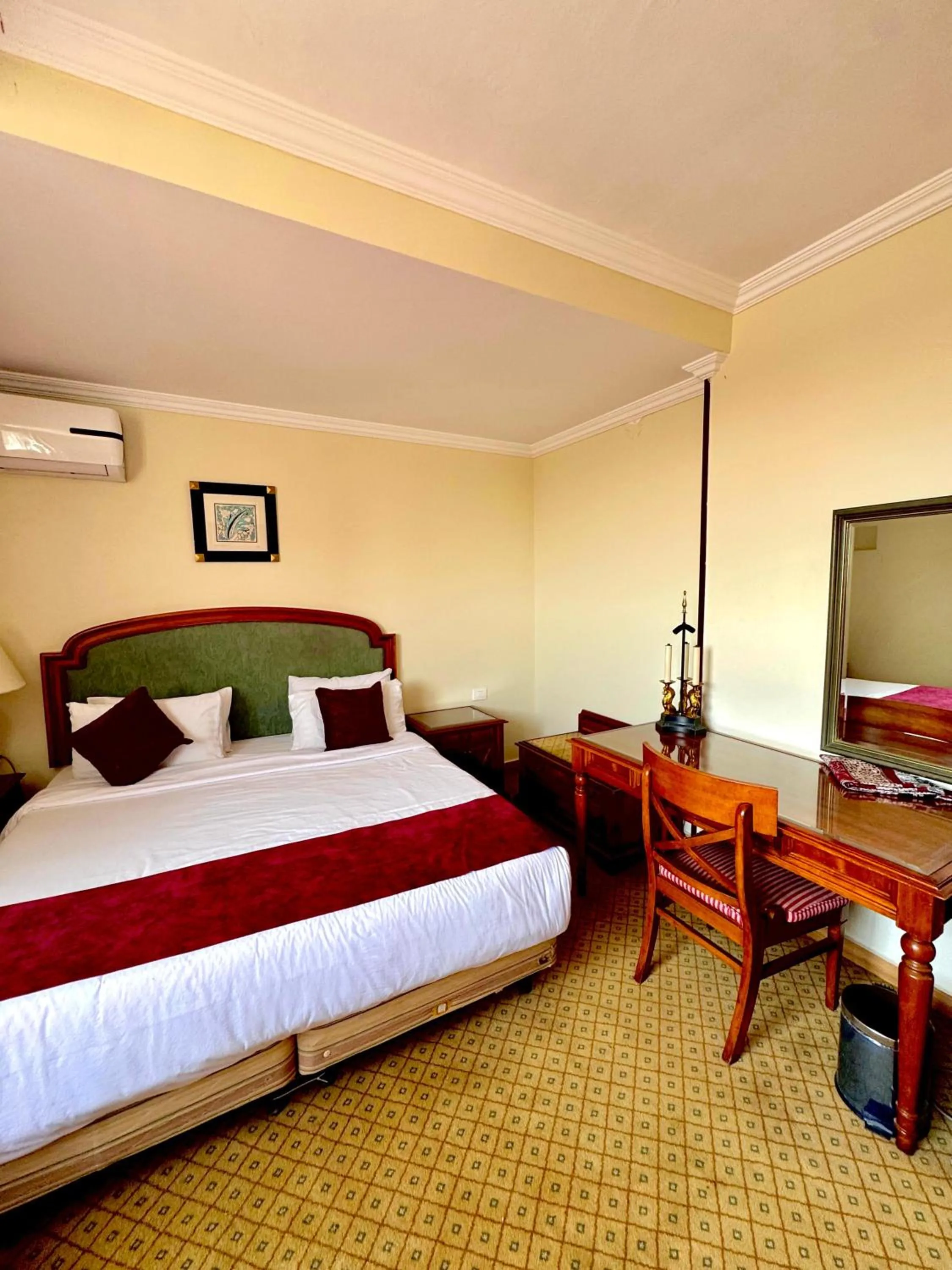 Bed in PYRAMIDS TOWER Inn