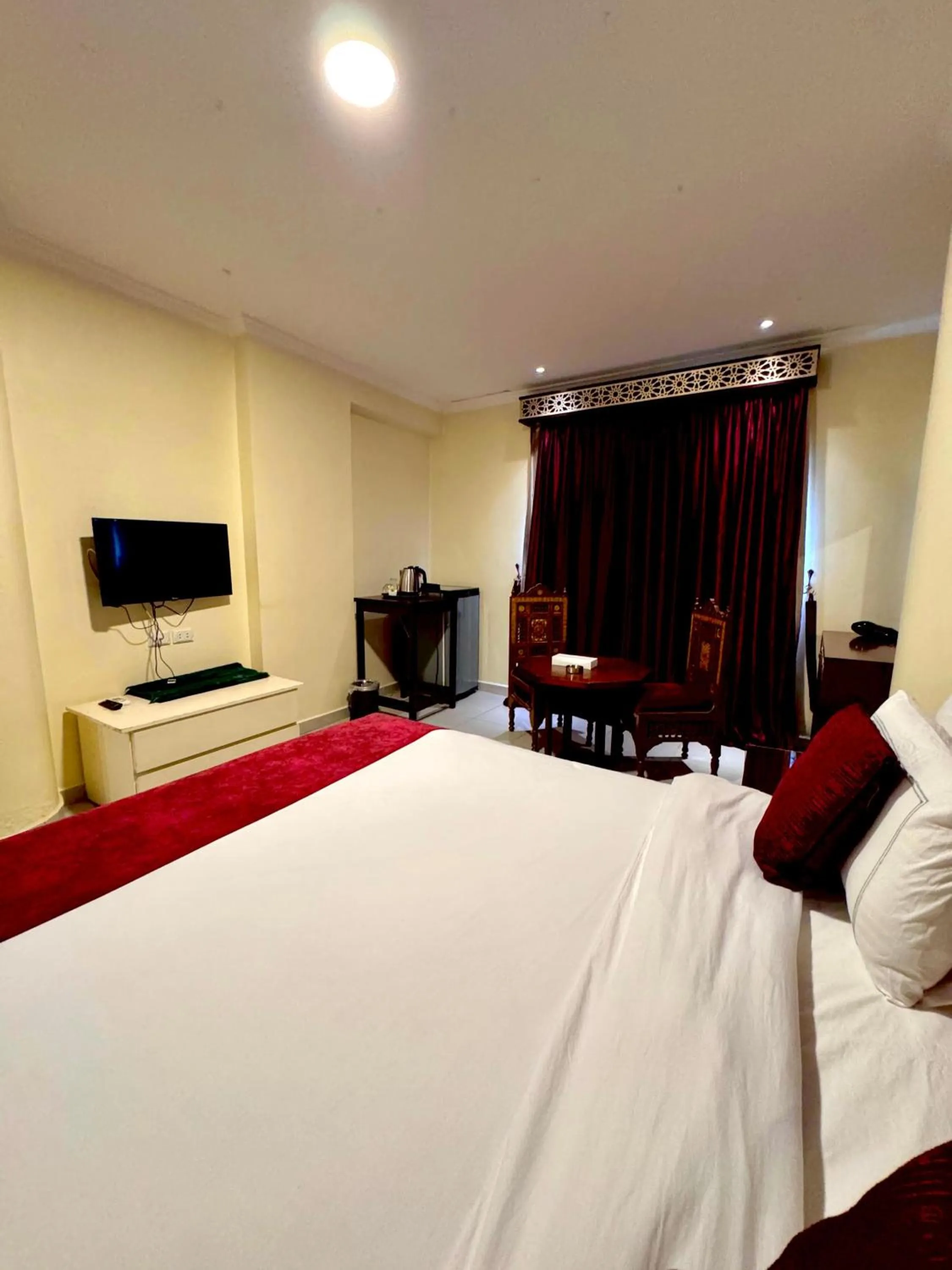 Bed in PYRAMIDS TOWER Inn