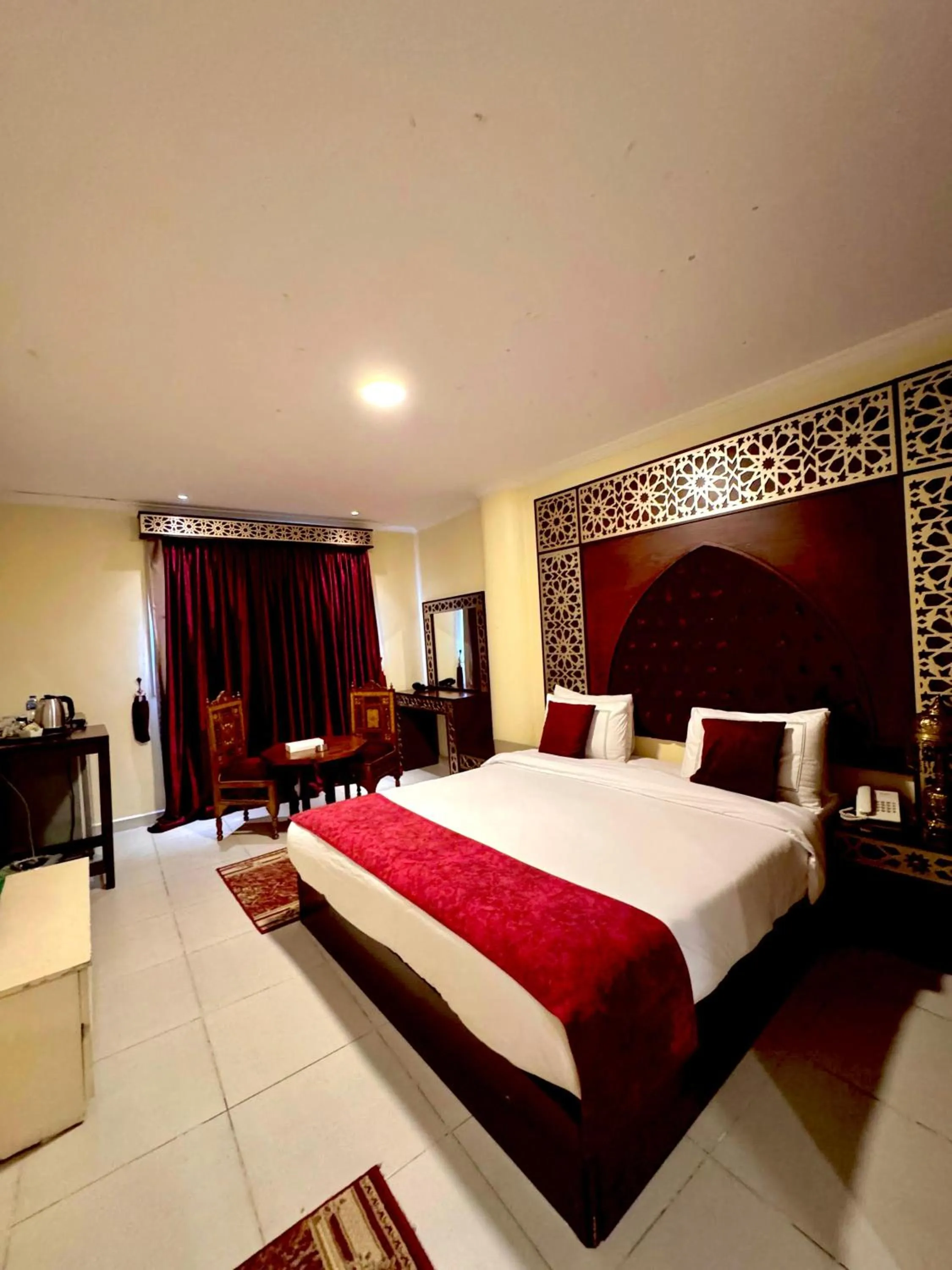 Bed in PYRAMIDS TOWER Inn