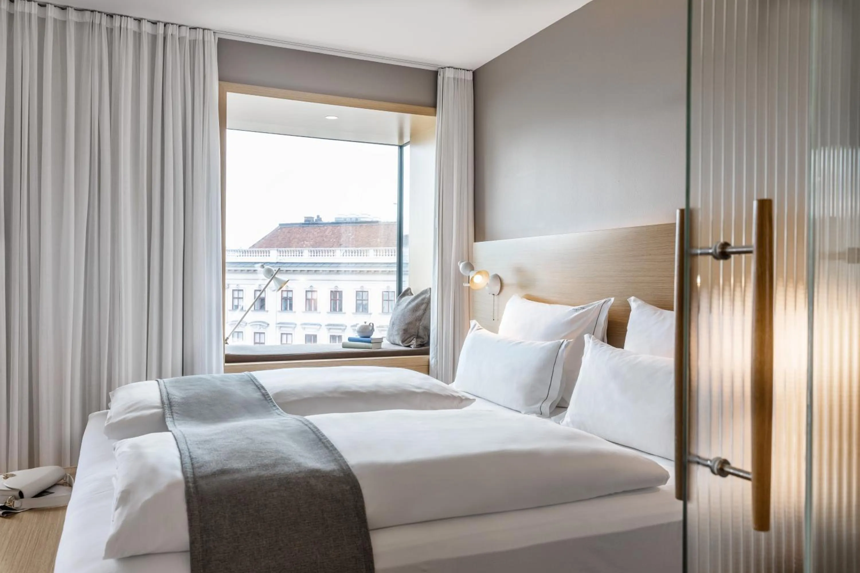 View (from property/room), Bed in The Guesthouse Vienna