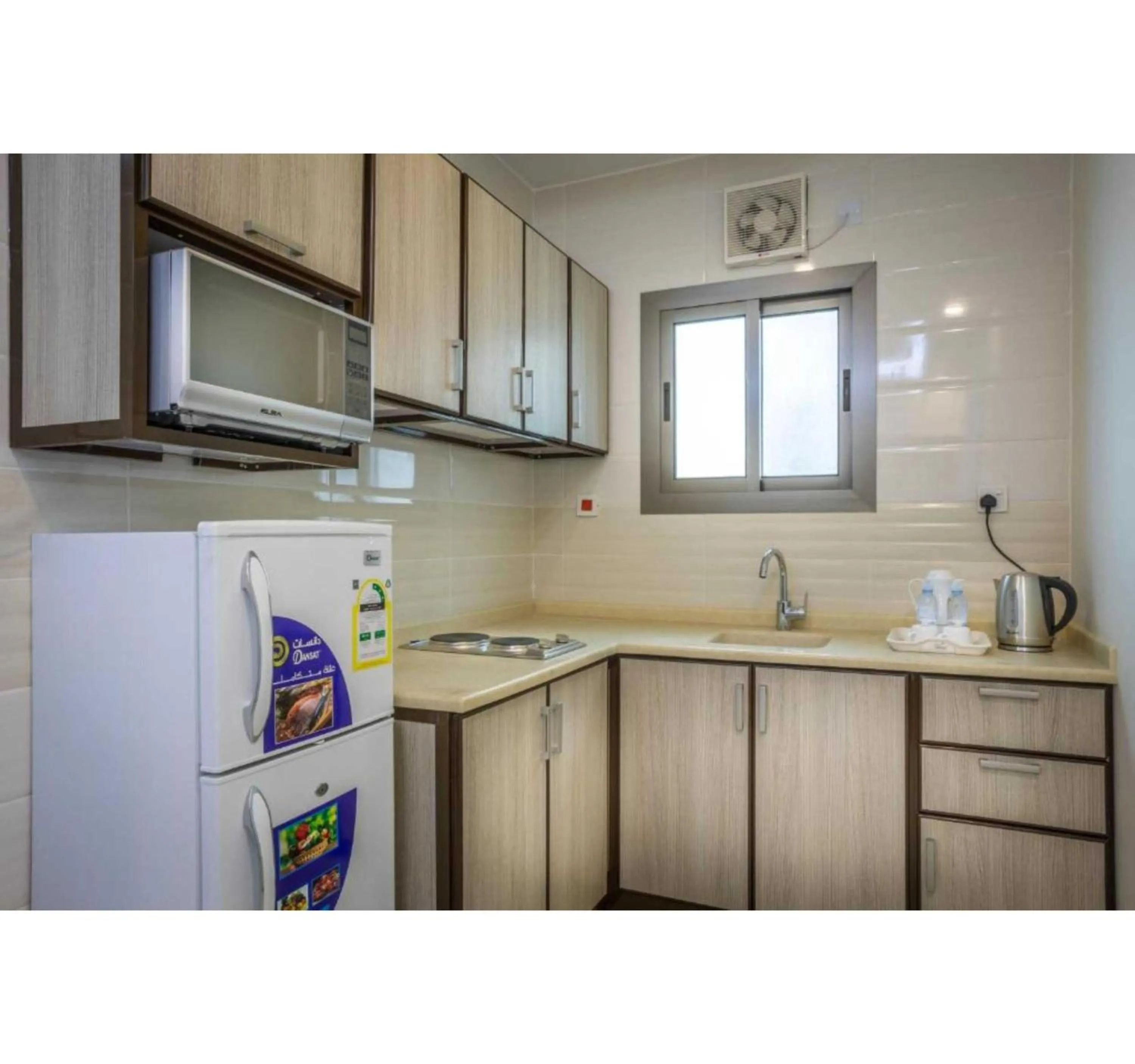 kitchen in Palette Pearl Suites & Apartments