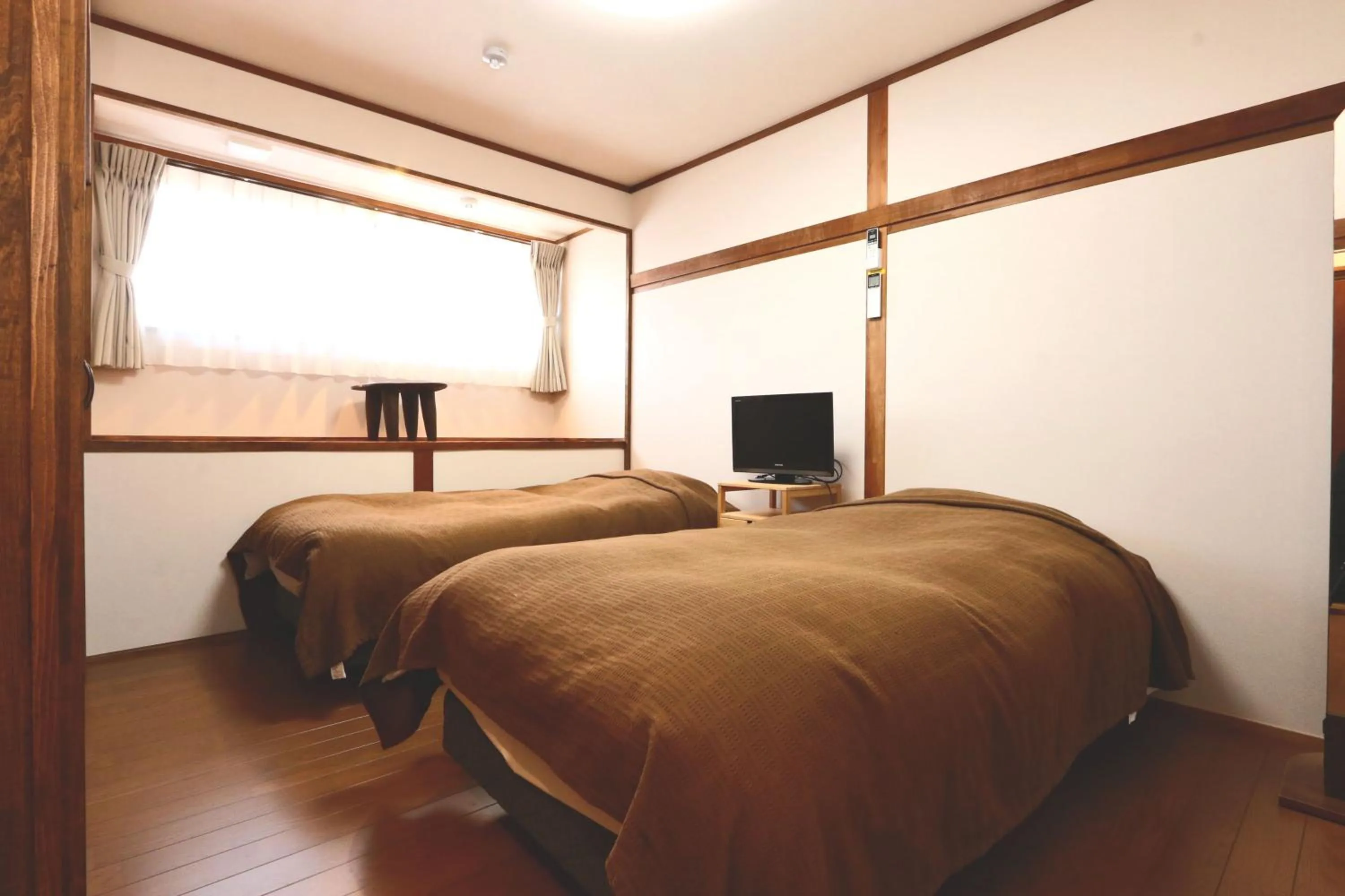 Photo of the whole room, Bed in Hanamizuki