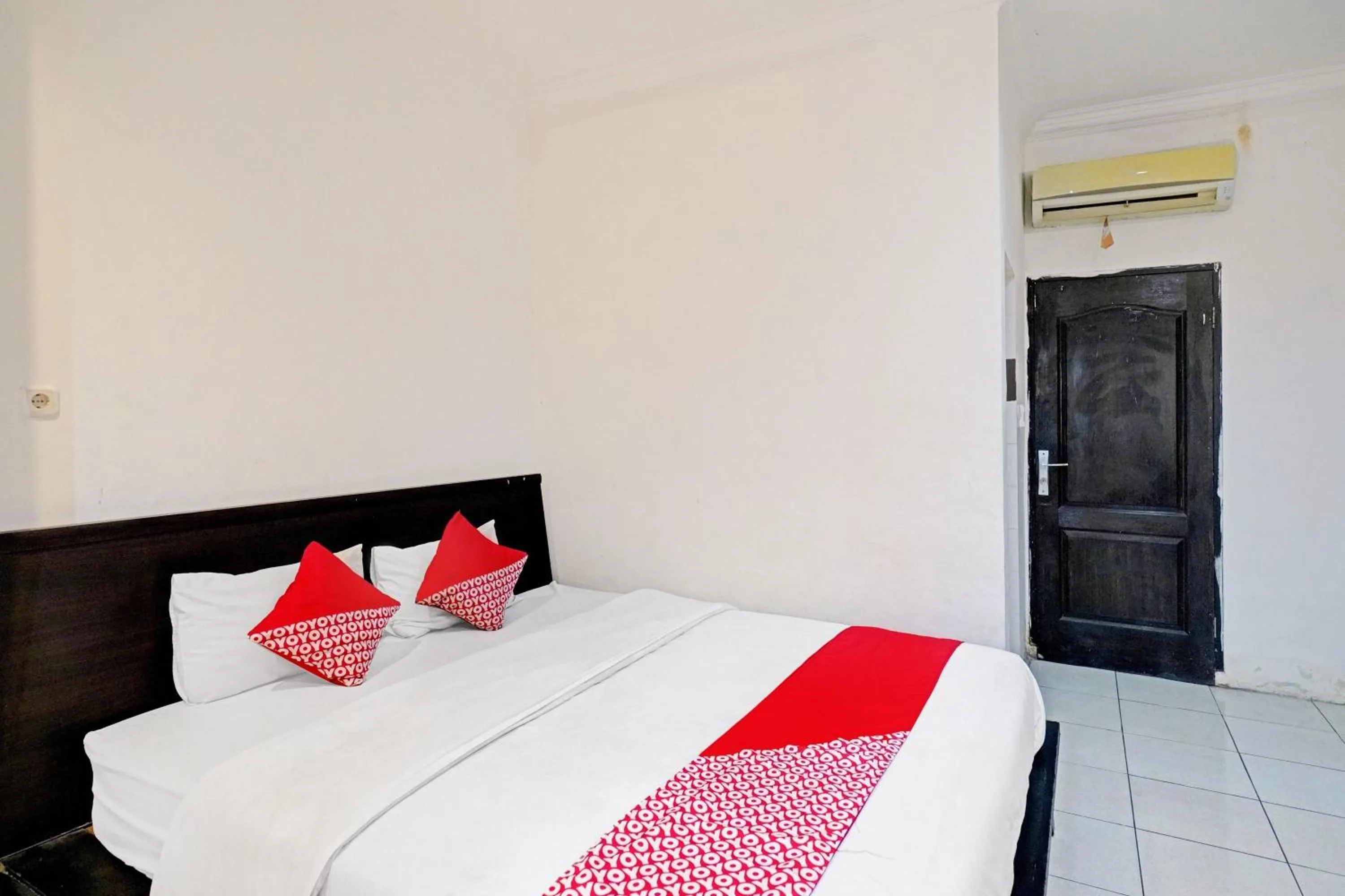 Bedroom in OYO 90450 Sentra Inn