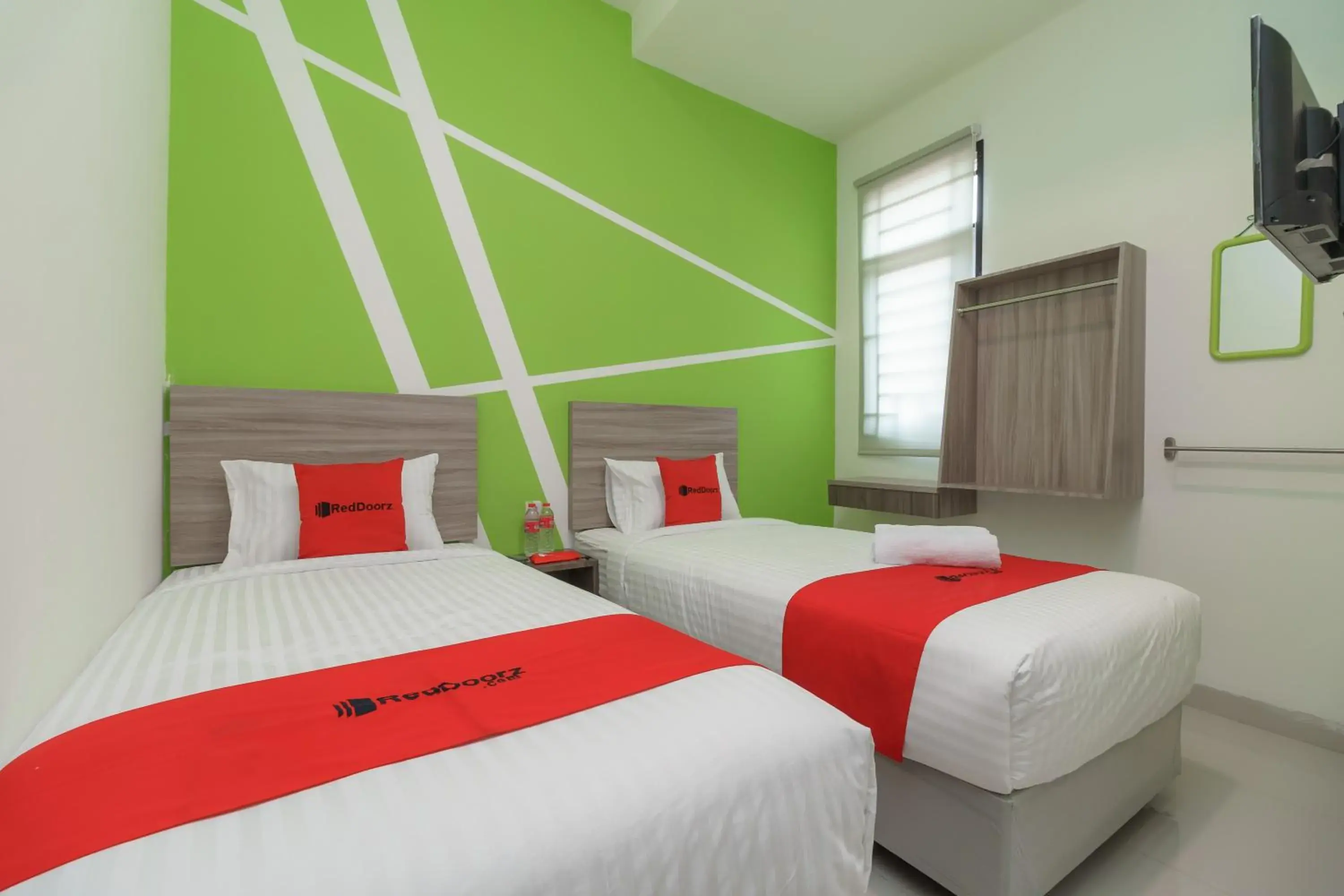 Bedroom, Bed in RedDoorz Plus at Grand Tara Homestay Palembang Bedroom, Bed in RedDoorz Plus at Grand Tara Homestay Palembang