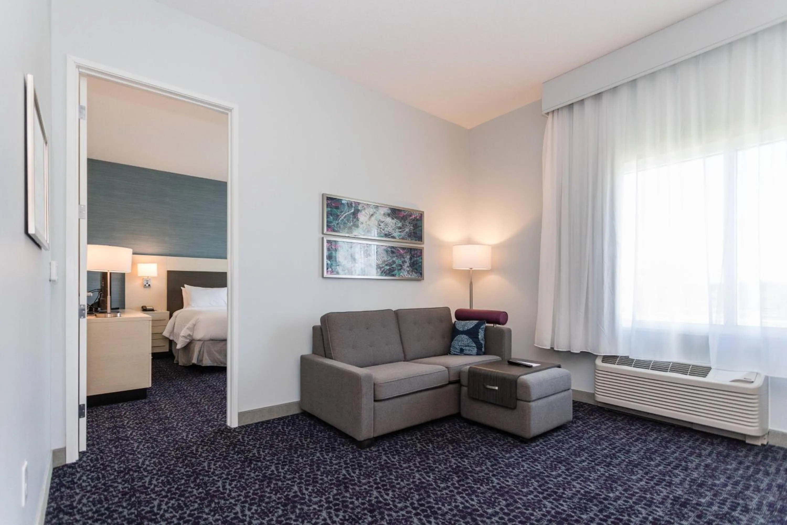 Living room, Bed in TownePlace Suites Port St. Lucie I-95