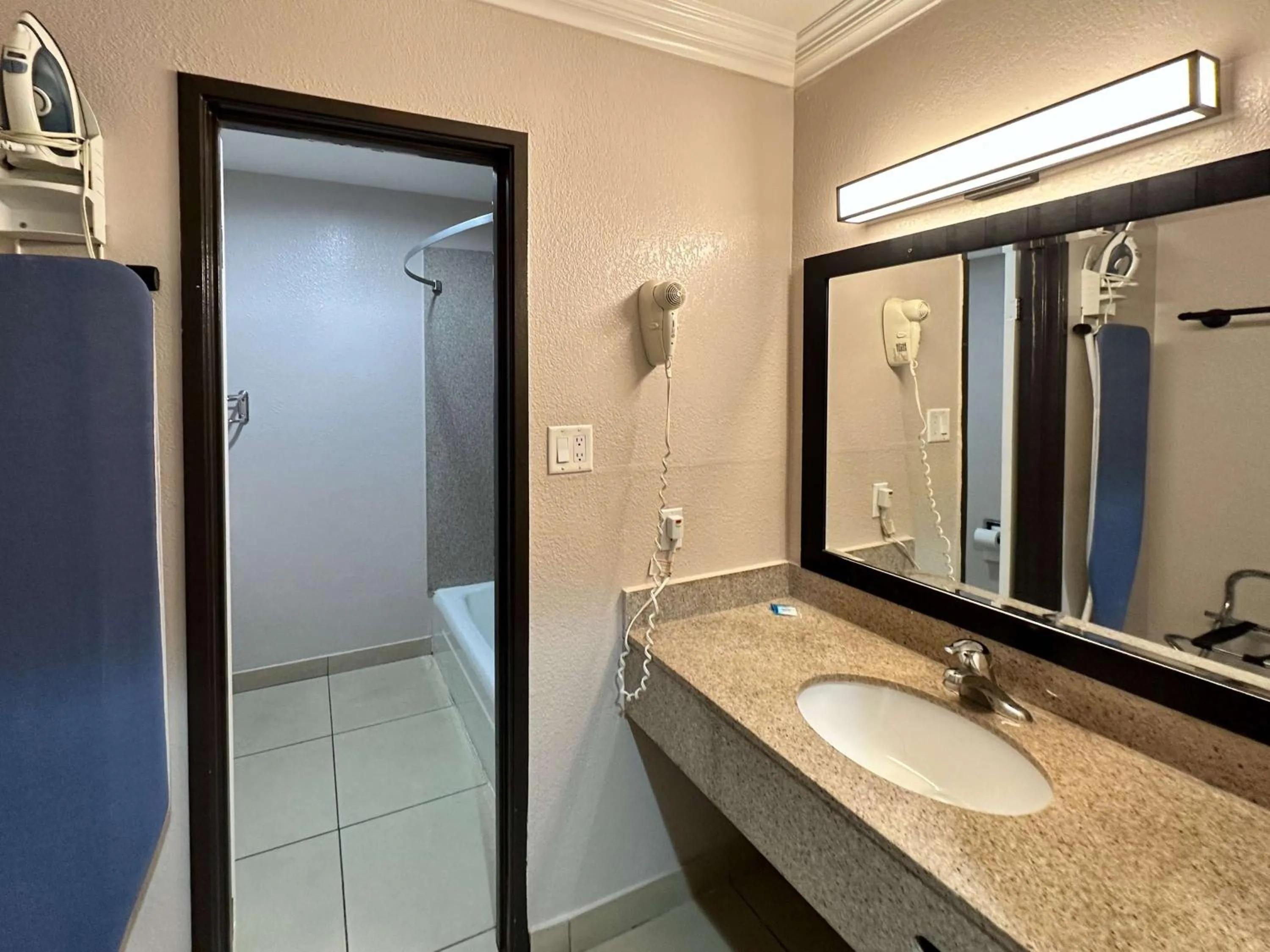 Bedroom in Studio 6 Suites Mesa AZ Near Downtown & Sloan Park