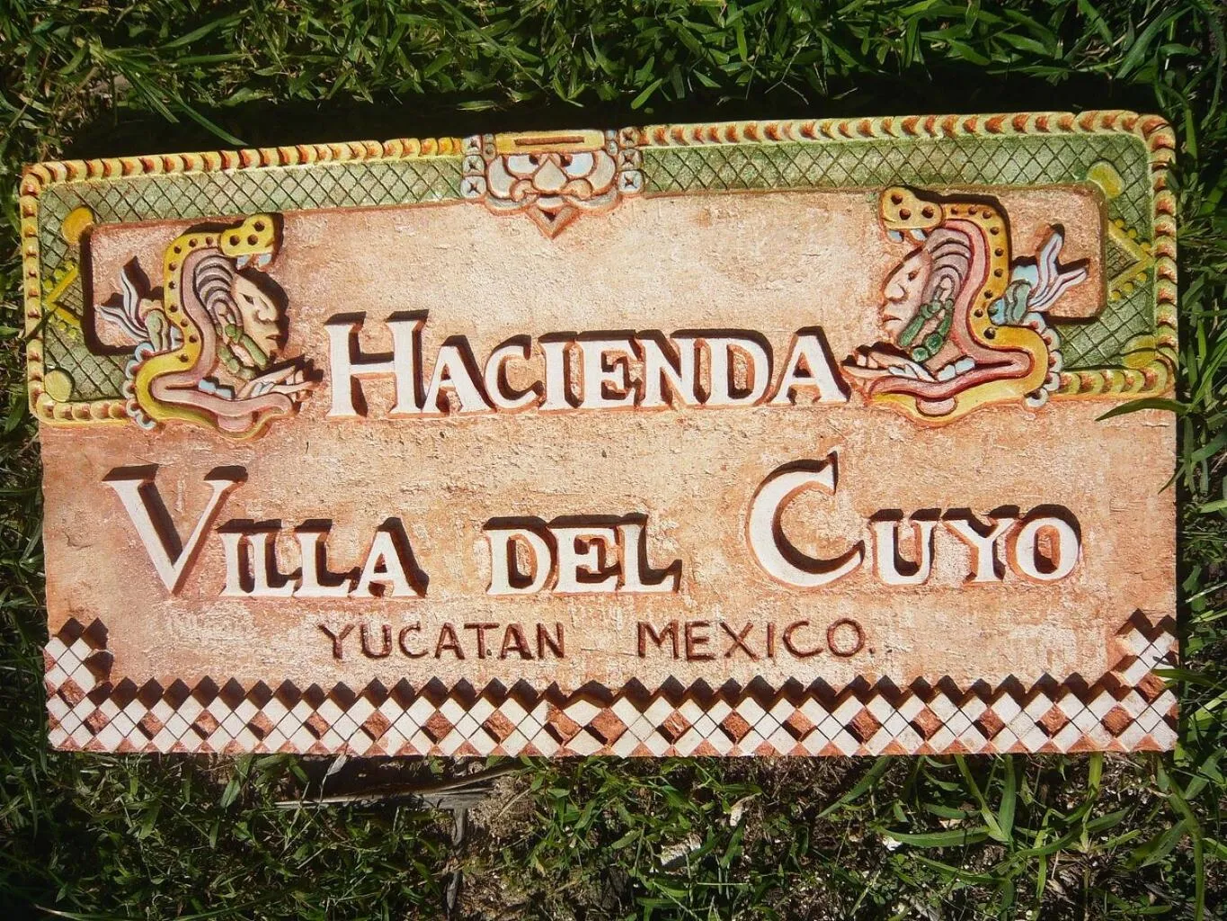 Property logo or sign in Beachfront Apartment Hacienda del Cuyo