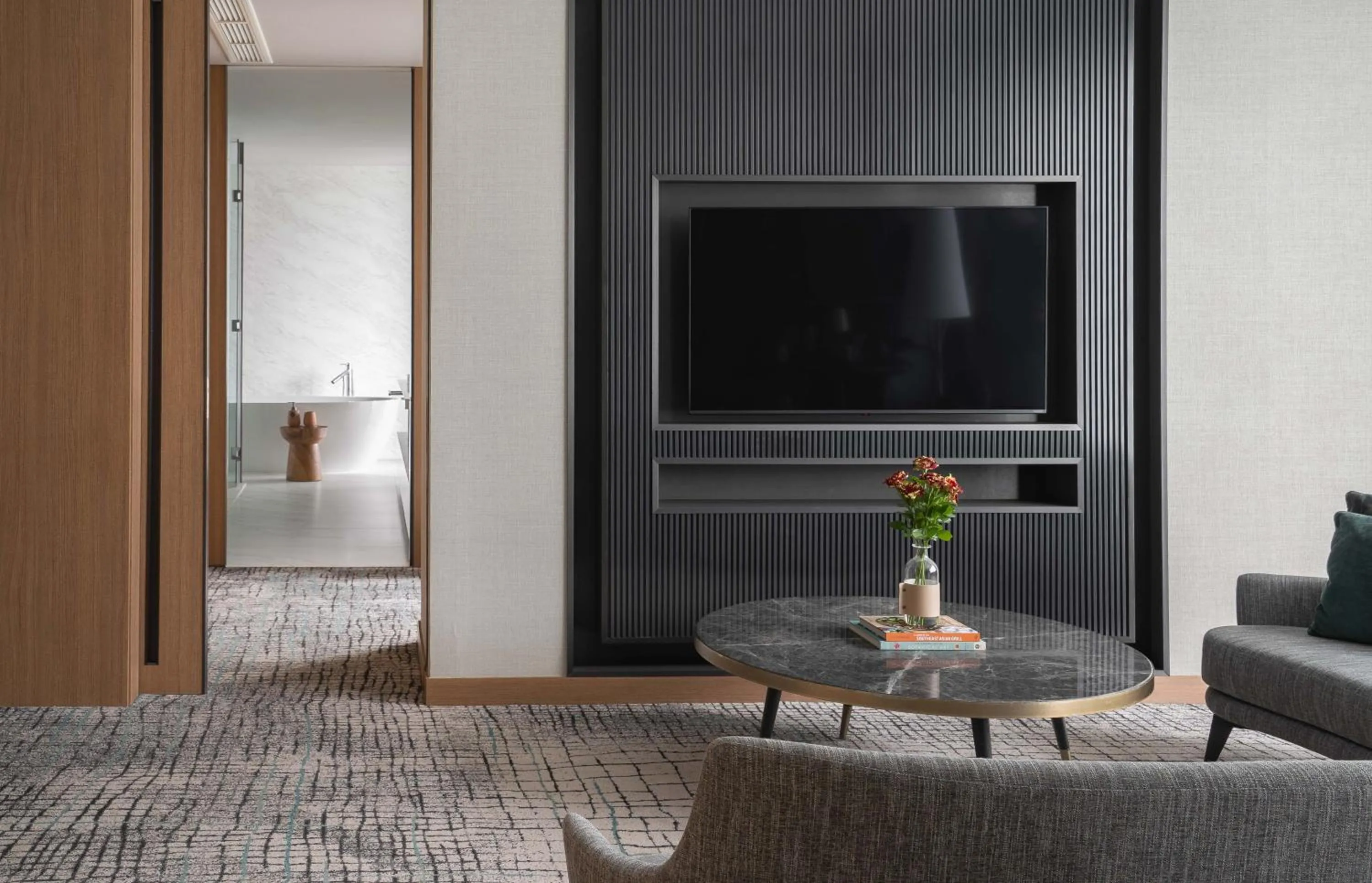 Communal lounge/ TV room in Kimpton Maa-Lai Bangkok by IHG