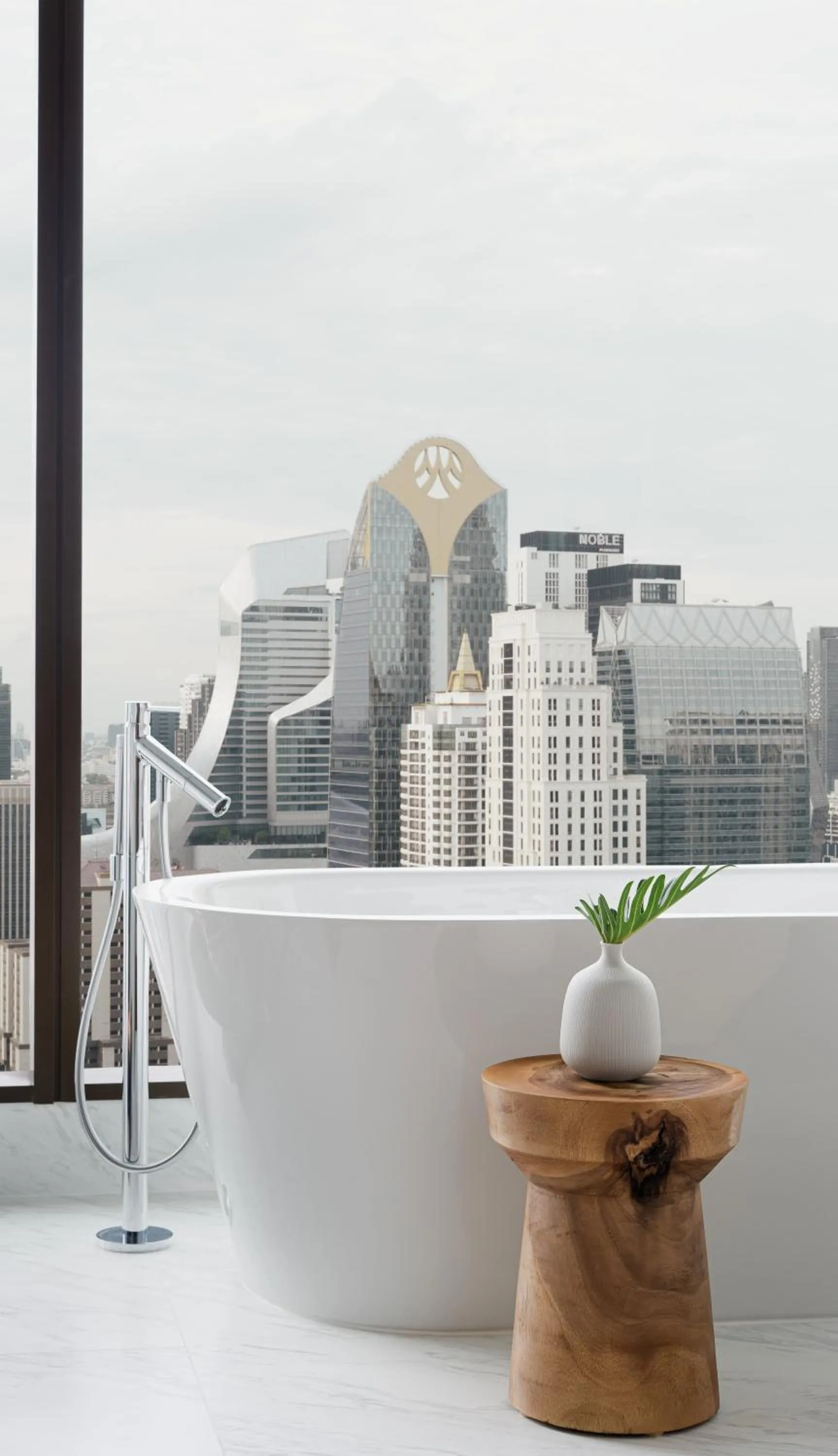 Bathroom in Kimpton Maa-Lai Bangkok by IHG