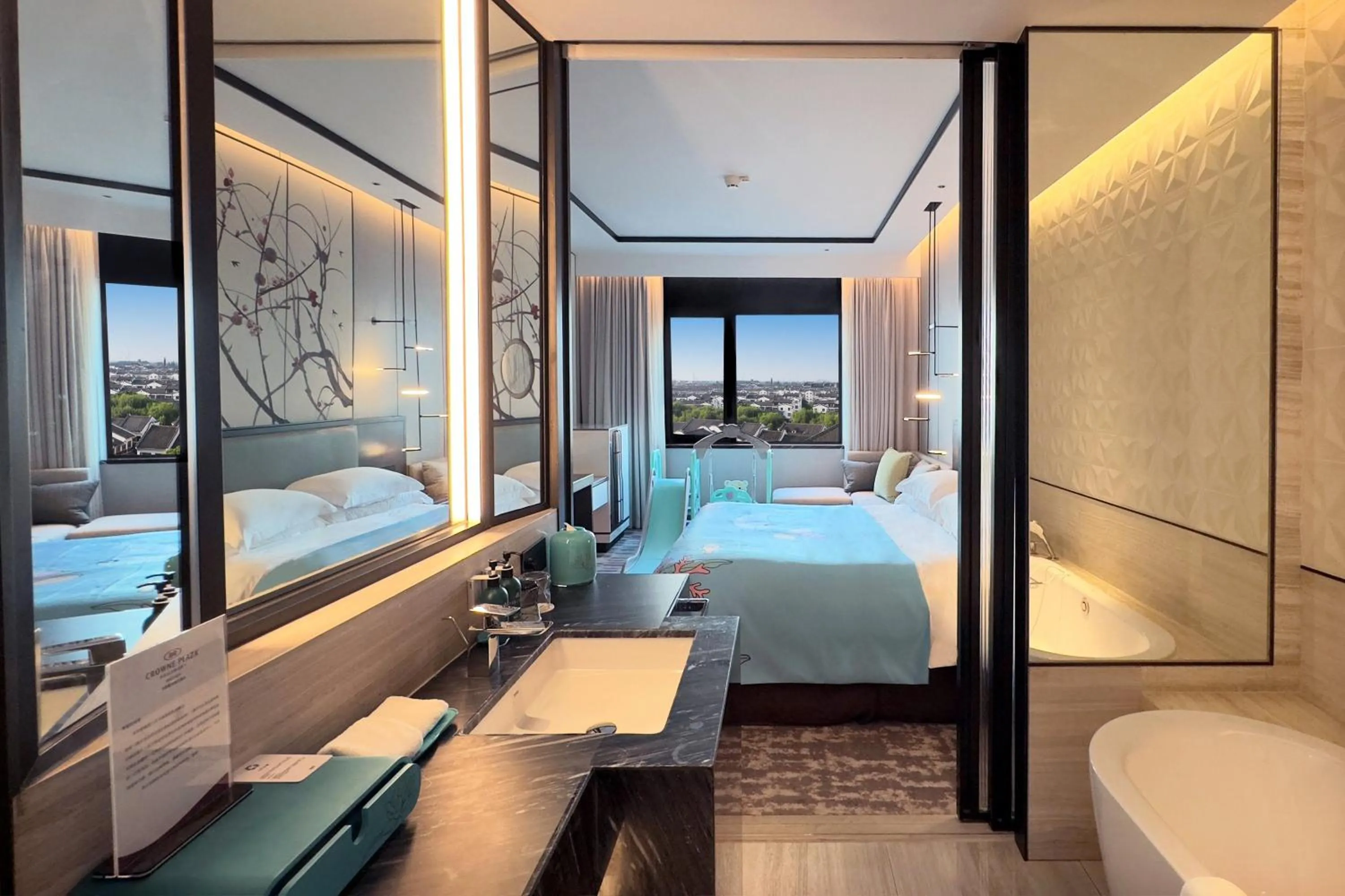 Photo of the whole room, Bed in Crowne Plaza Wuzhen by IHG