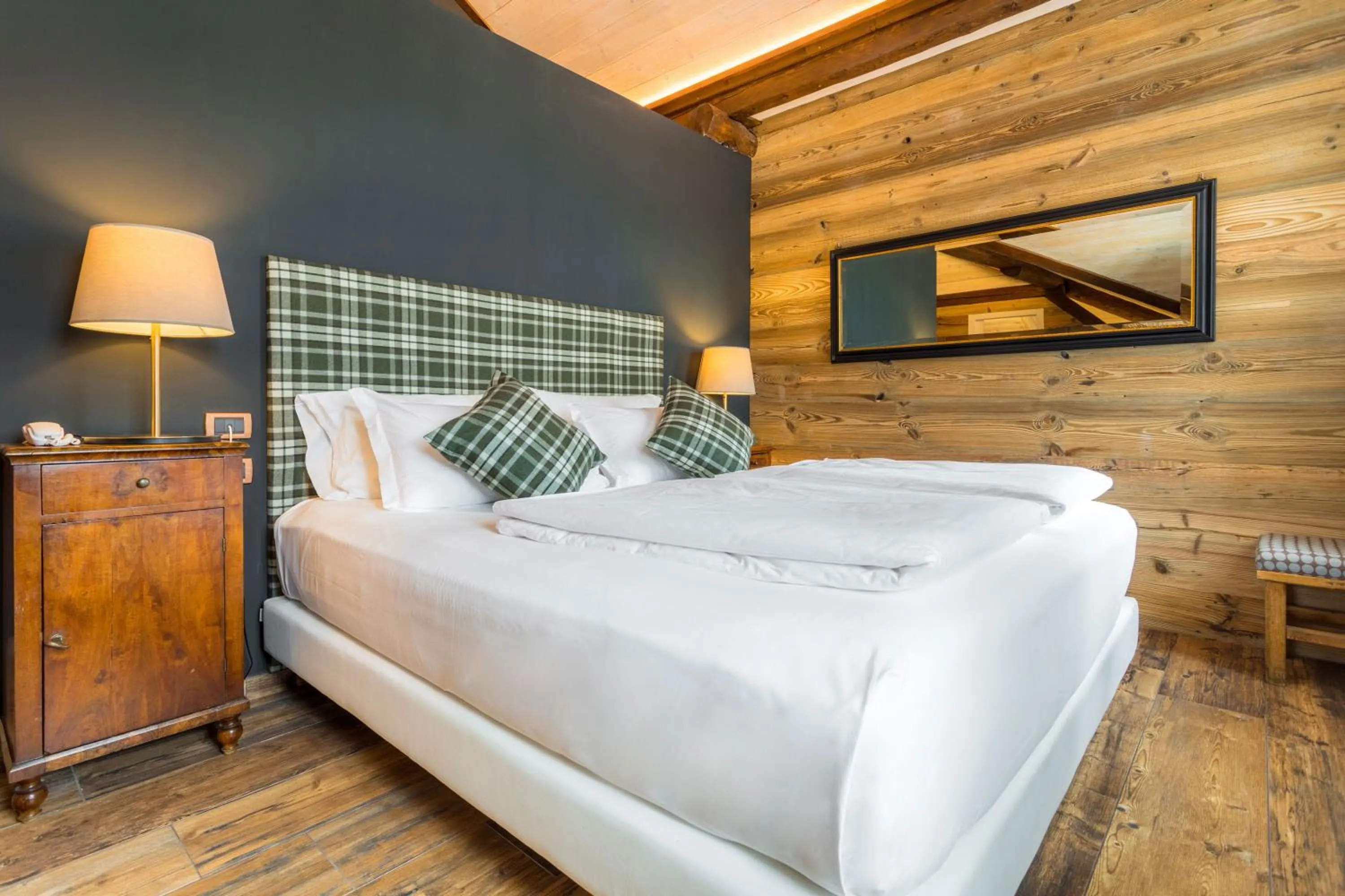 Bed in John Luxury Suites