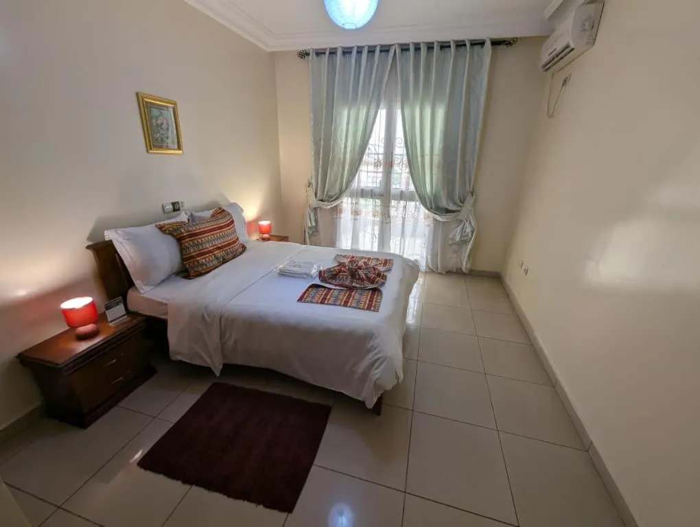 Bedroom, Bed in Résidences hôtelières Micheline et Emile BASTOS