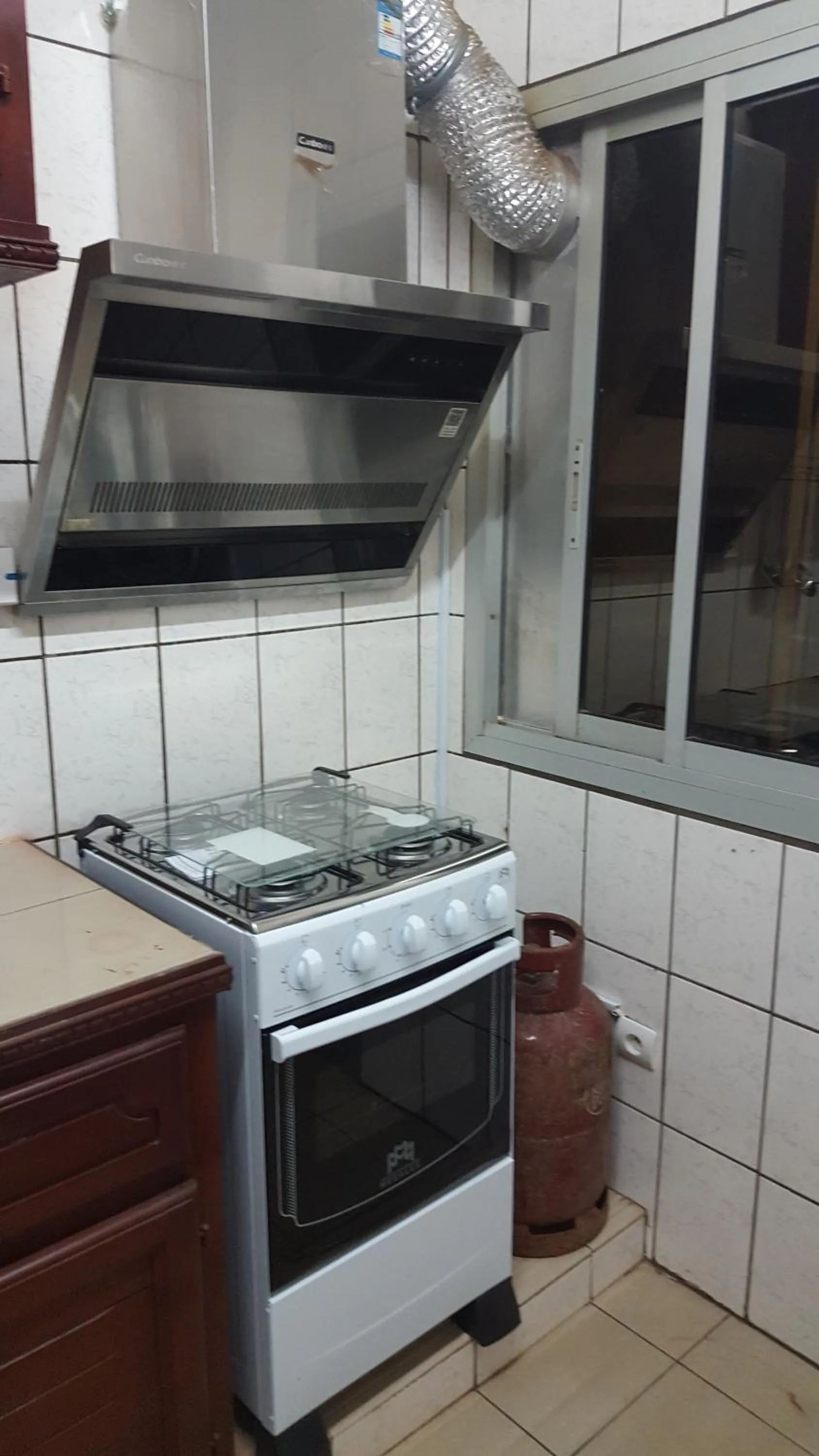 Kitchen or kitchenette in Résidences hôtelières Micheline et Emile BASTOS