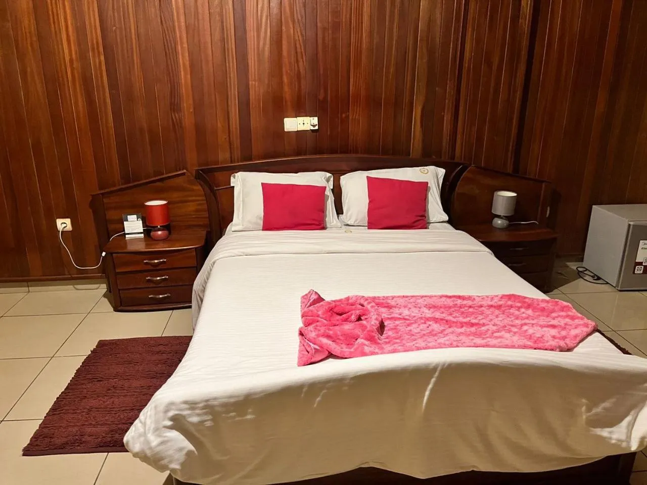 Bed in Résidences hôtelières Micheline et Emile BASTOS