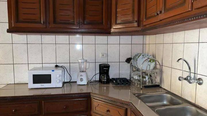 kitchen in Résidences hôtelières Micheline et Emile BASTOS