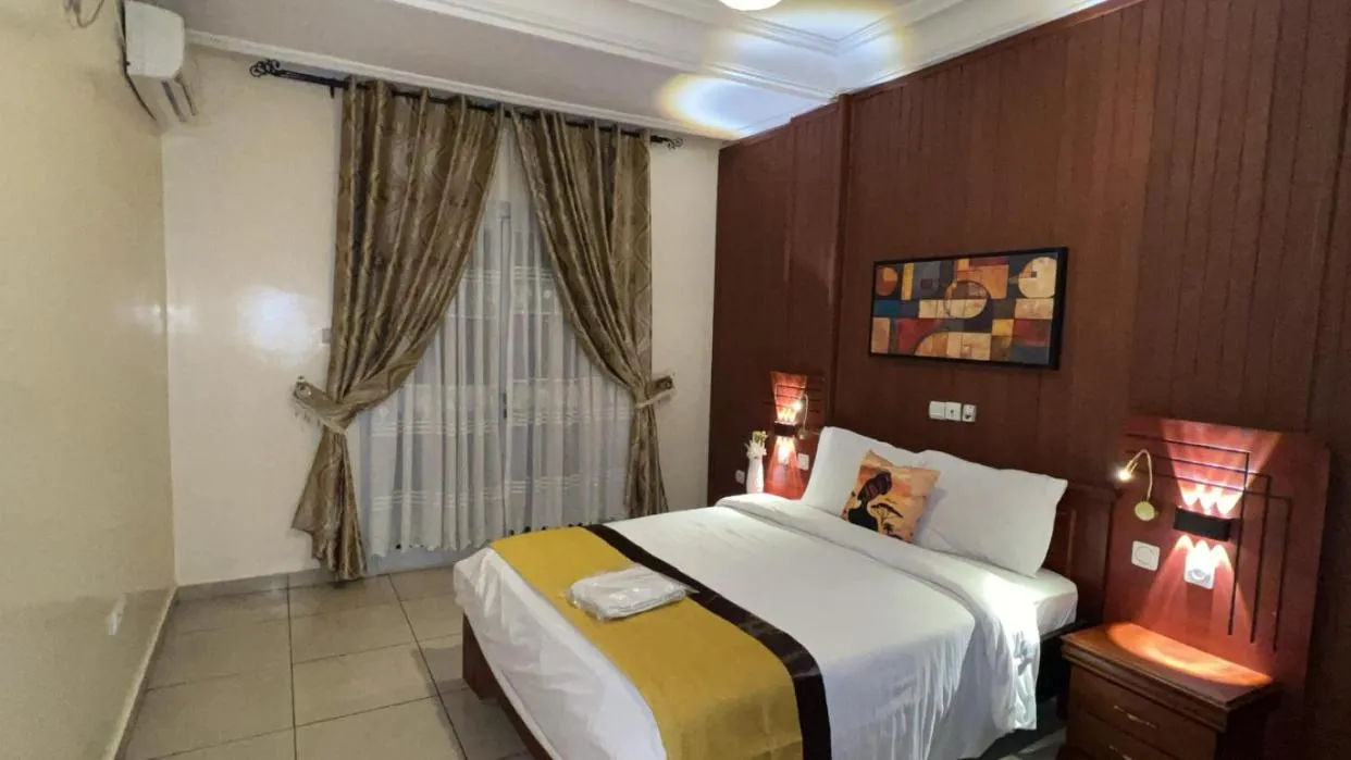 Bedroom, Bed in Résidences hôtelières Micheline et Emile BASTOS