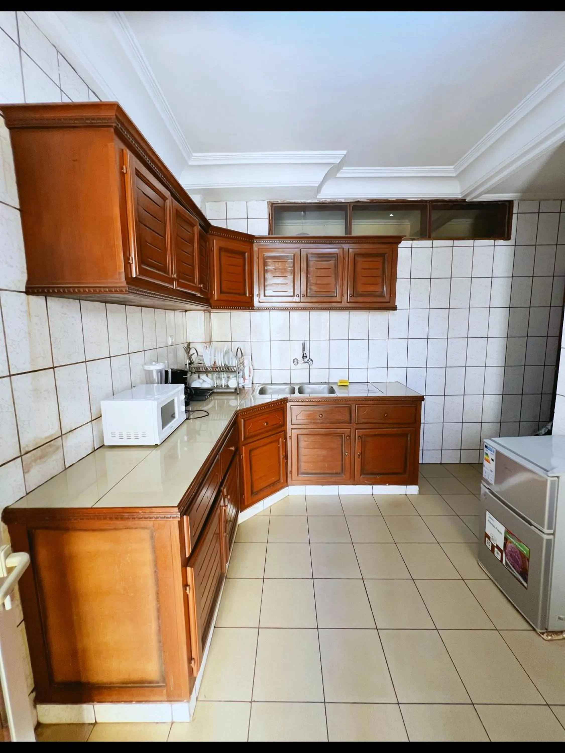 kitchen in Résidences hôtelières Micheline et Emile BASTOS