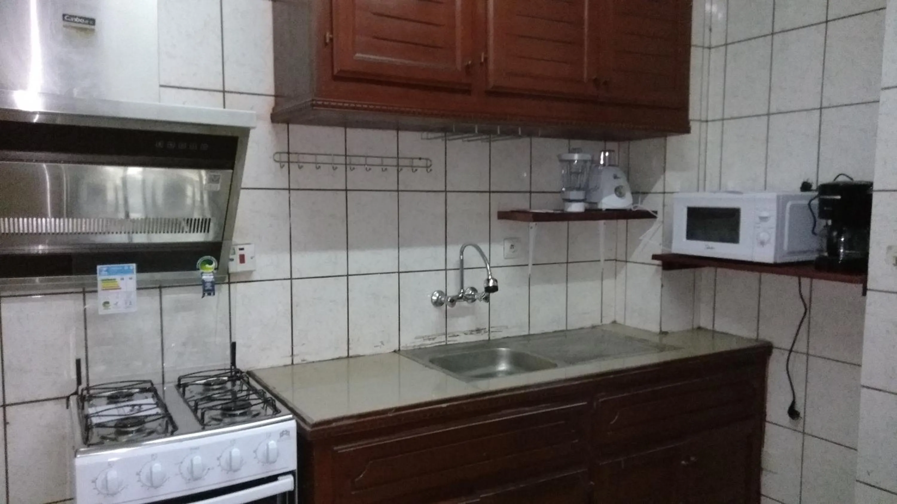 Kitchen or kitchenette in Résidences hôtelières Micheline et Emile BASTOS