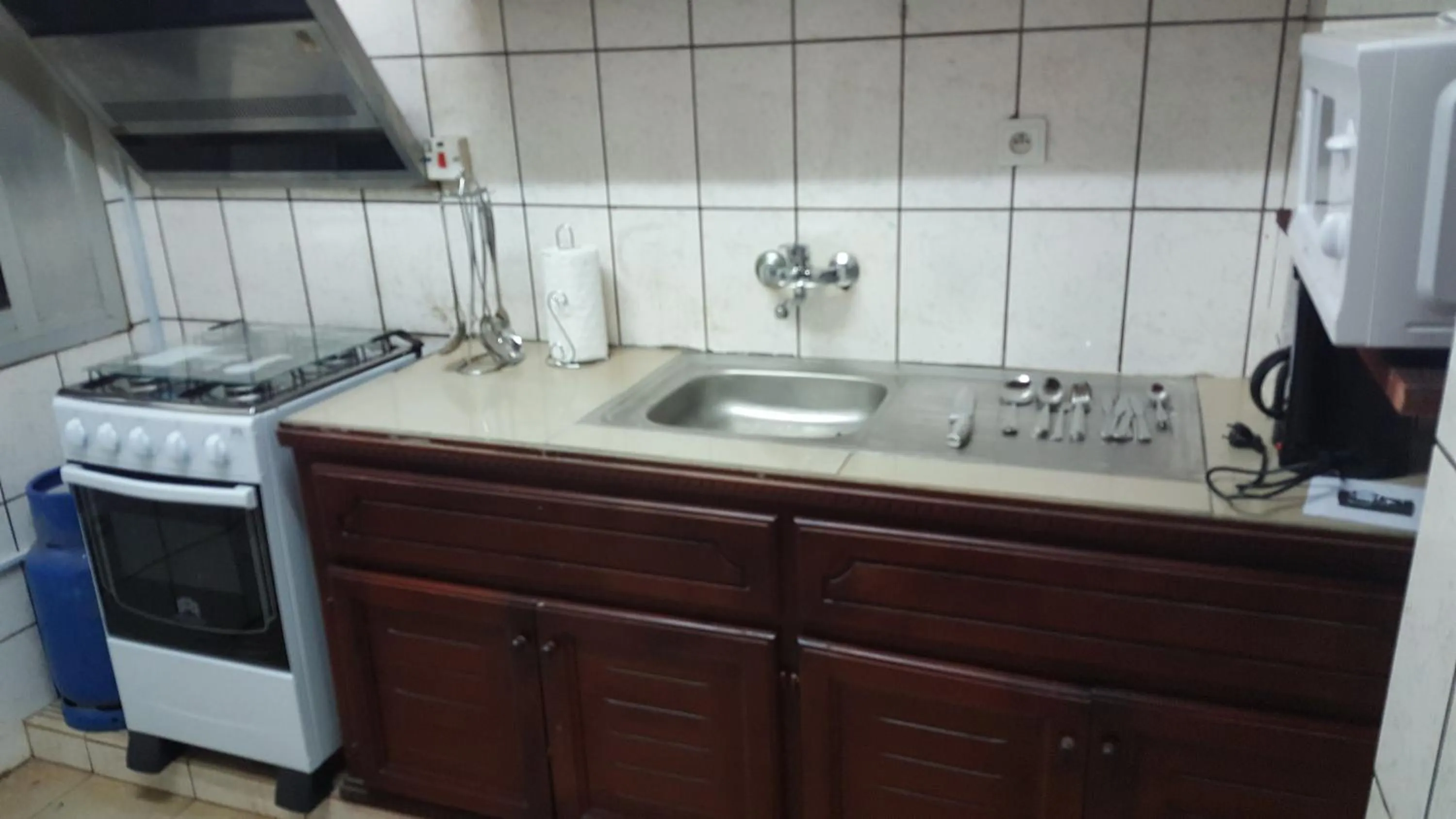 Kitchen or kitchenette in Résidences hôtelières Micheline et Emile BASTOS