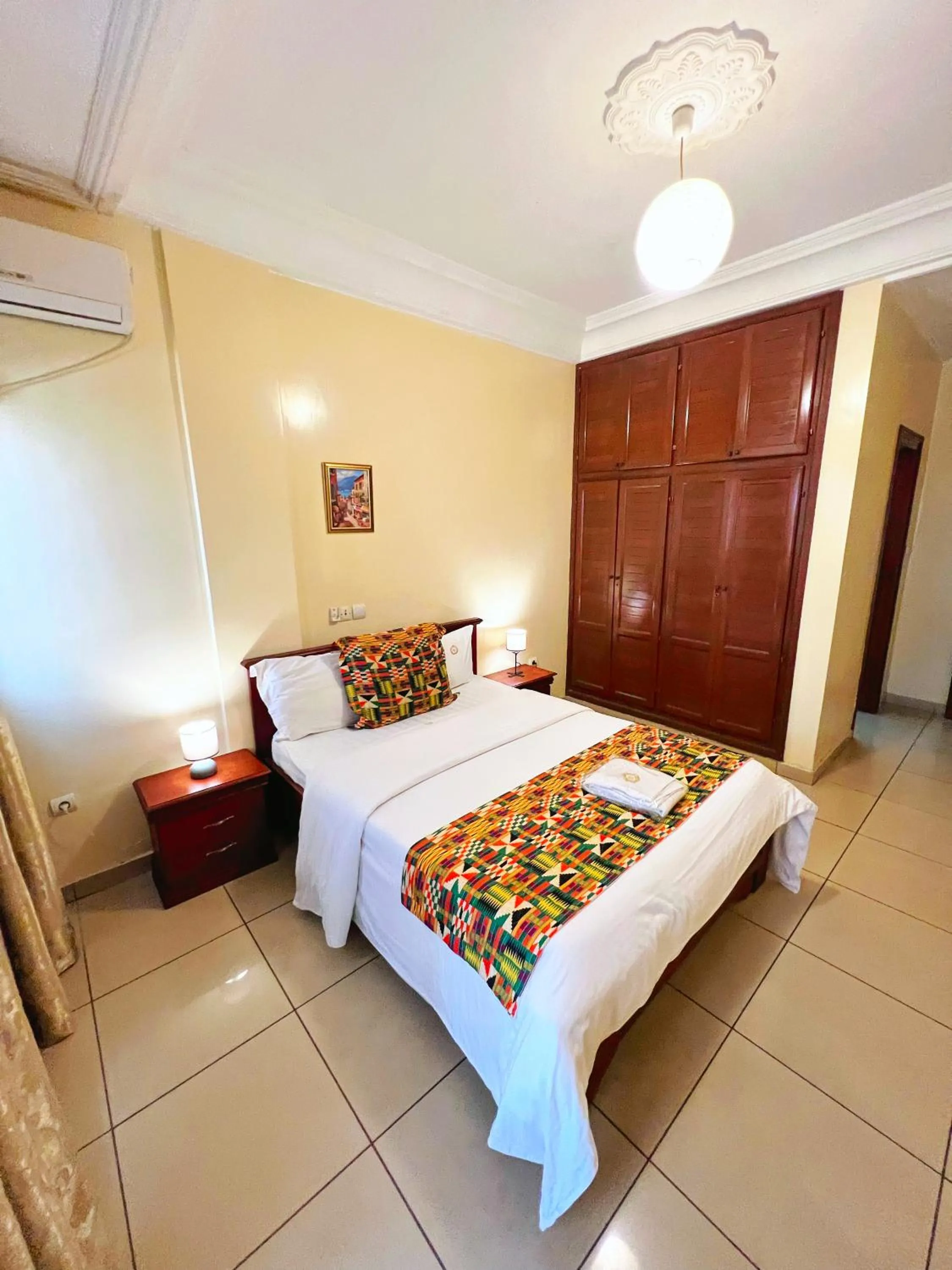 kitchen, Bed in Résidences hôtelières Micheline et Emile BASTOS