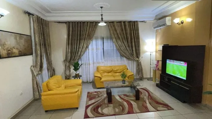 Living room in Résidences hôtelières Micheline et Emile BASTOS