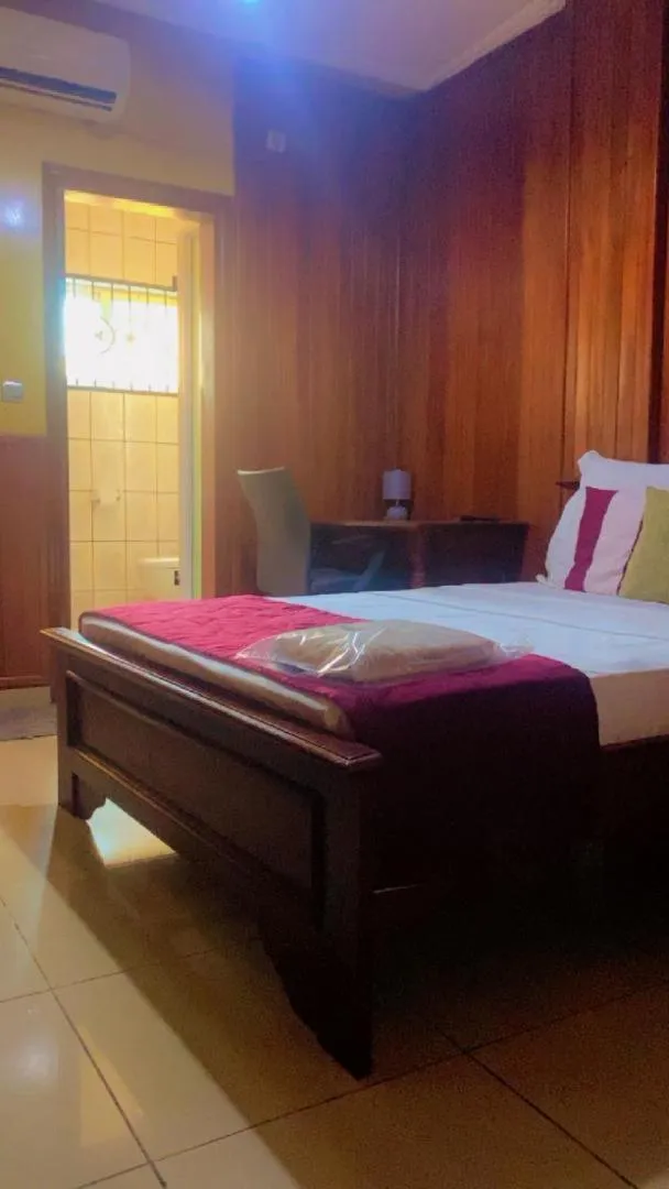 Bedroom, Bed in Résidences hôtelières Micheline et Emile BASTOS