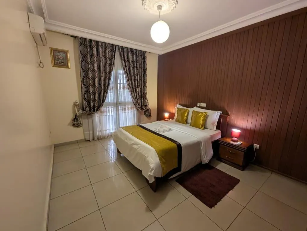 Bedroom, Bed in Résidences hôtelières Micheline et Emile BASTOS