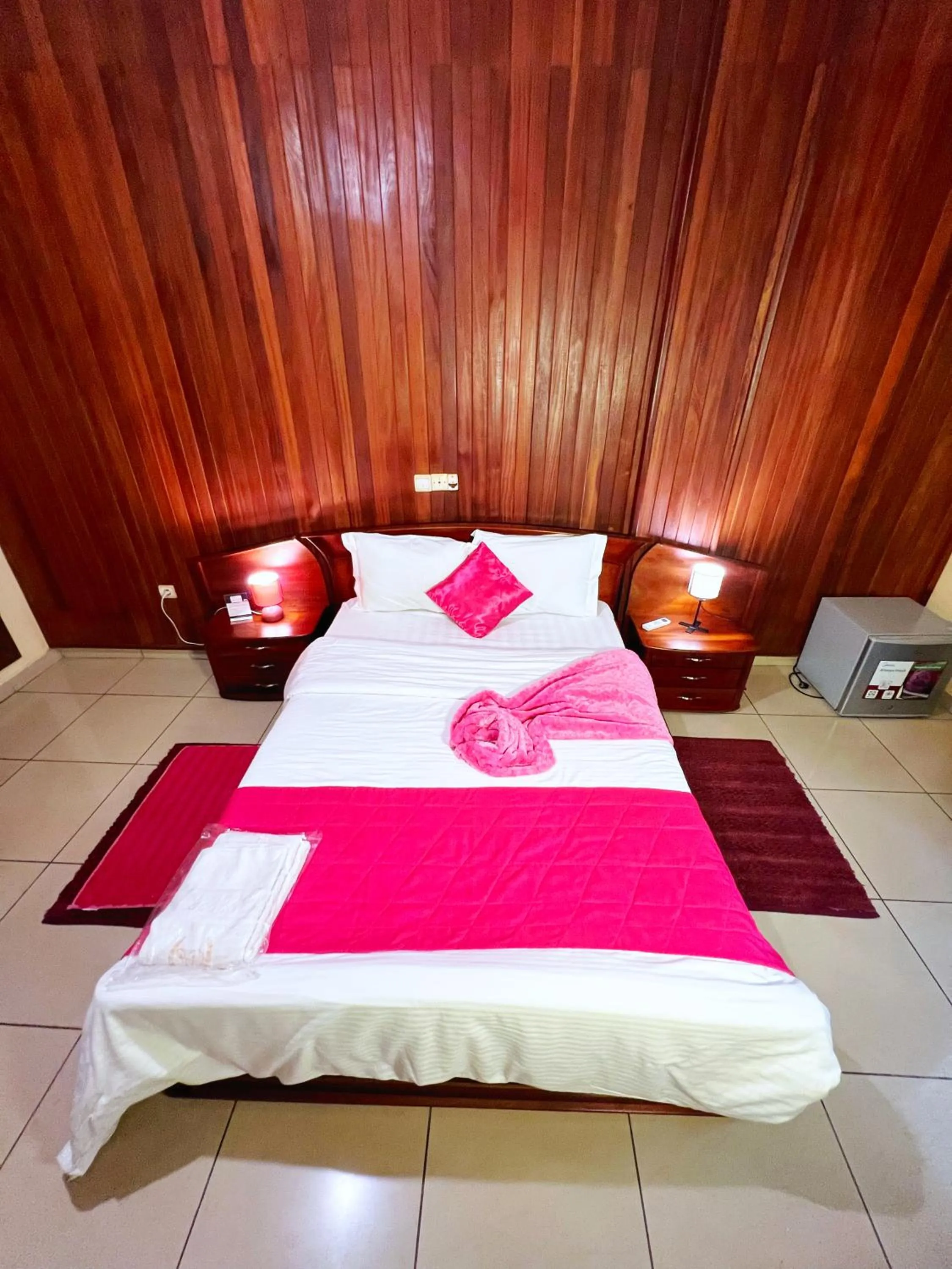 Bed in Résidences hôtelières Micheline et Emile BASTOS