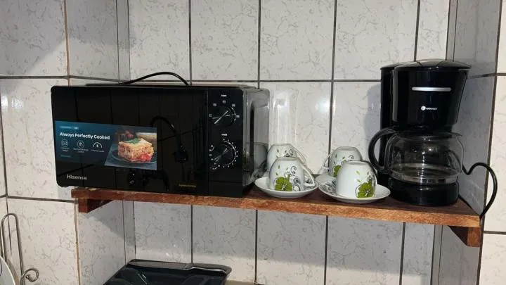 Kitchen or kitchenette in Résidences hôtelières Micheline et Emile BASTOS