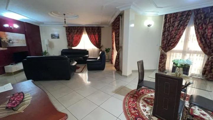 Living room in Résidences hôtelières Micheline et Emile BASTOS