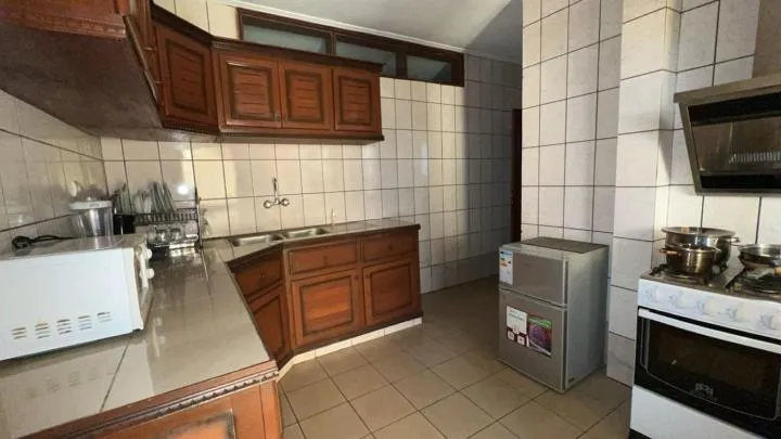 kitchen in Résidences hôtelières Micheline et Emile BASTOS