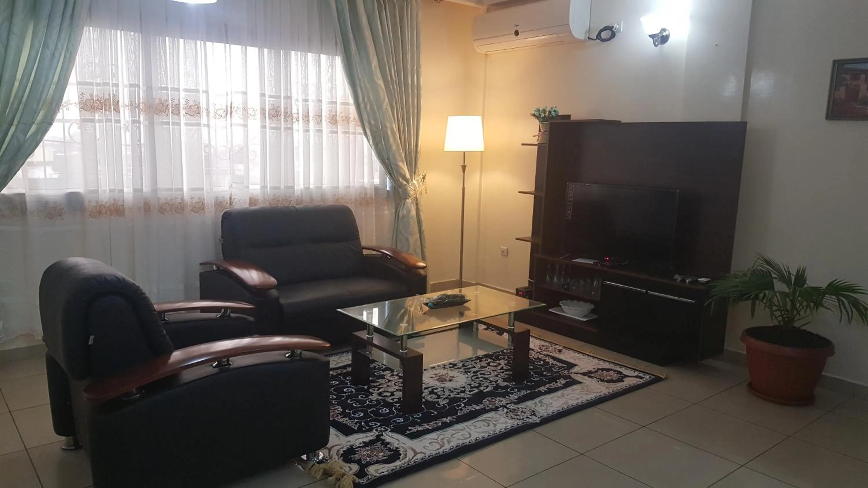 Living room in Résidences hôtelières Micheline et Emile BASTOS