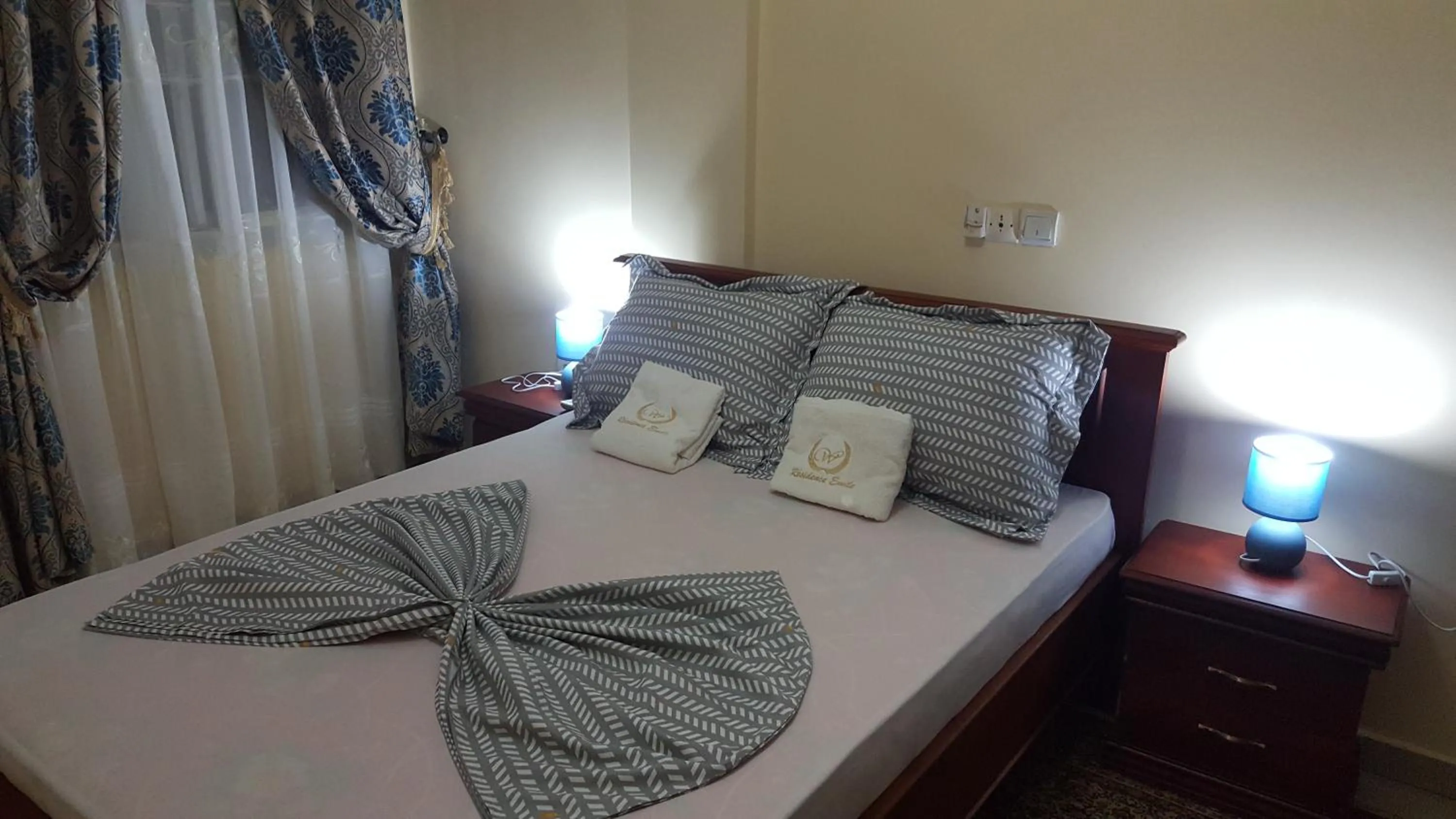 Bed in Résidences hôtelières Micheline et Emile BASTOS