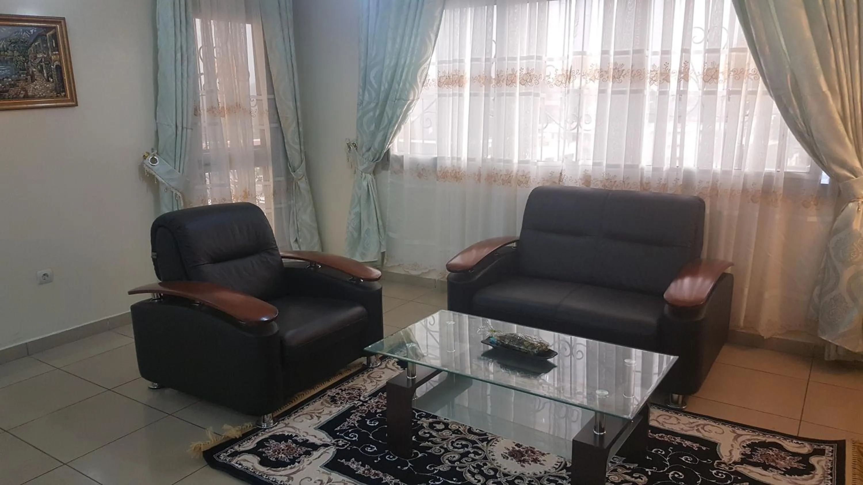 Living room in Résidences hôtelières Micheline et Emile BASTOS