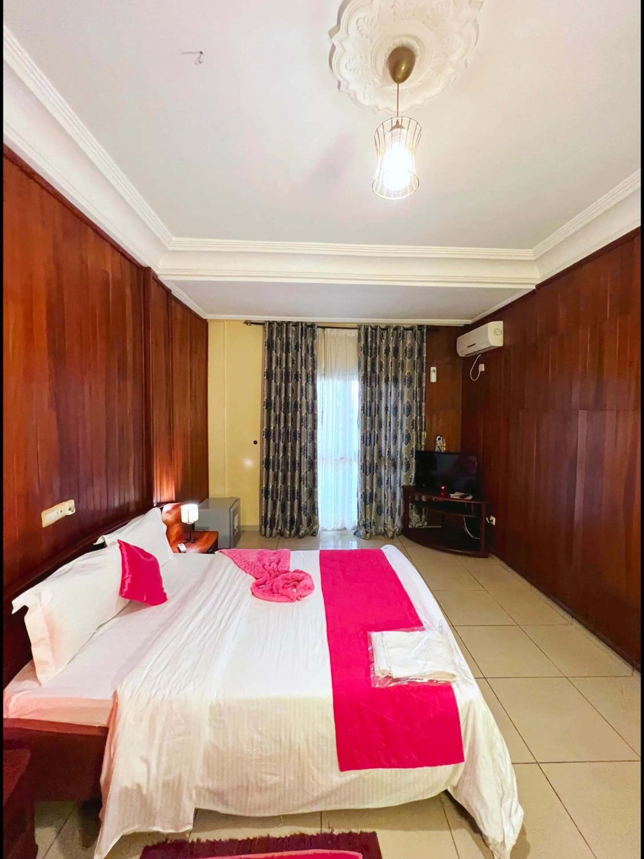 Bed in Résidences hôtelières Micheline et Emile BASTOS