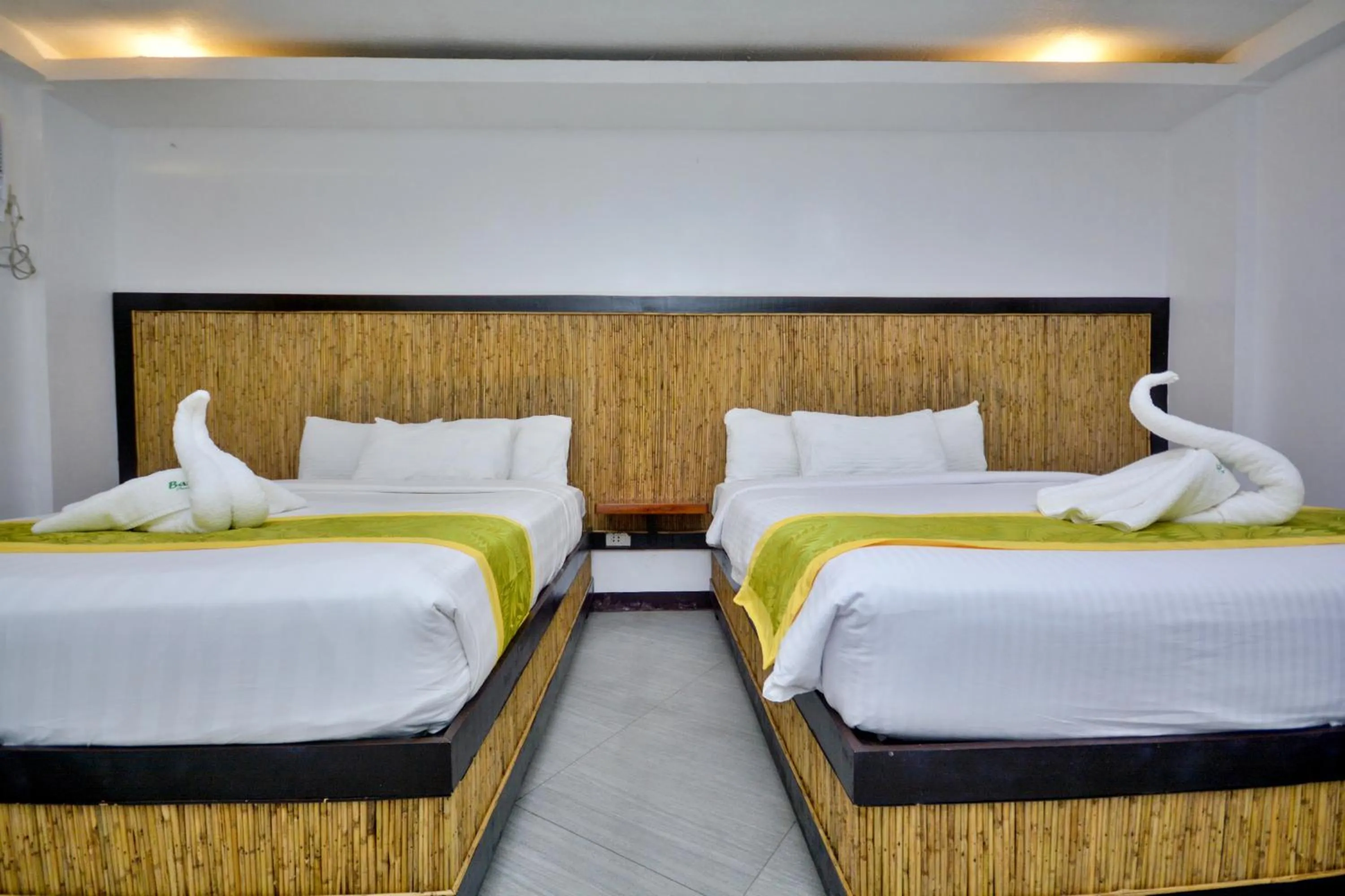Bed in Bamboo Beach Resort & Restaurant