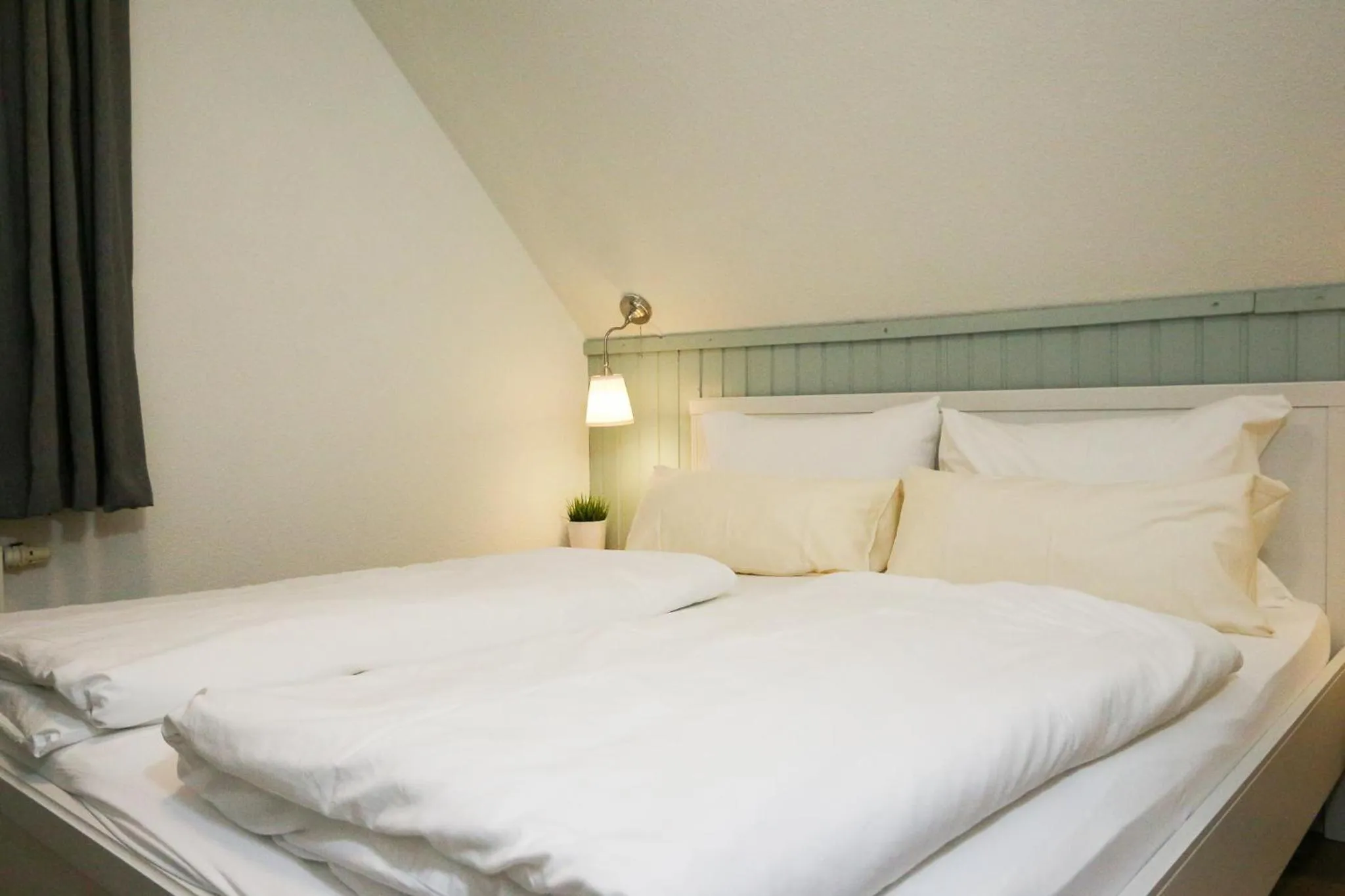 Bed in Captain Pahlen Ferienanlage