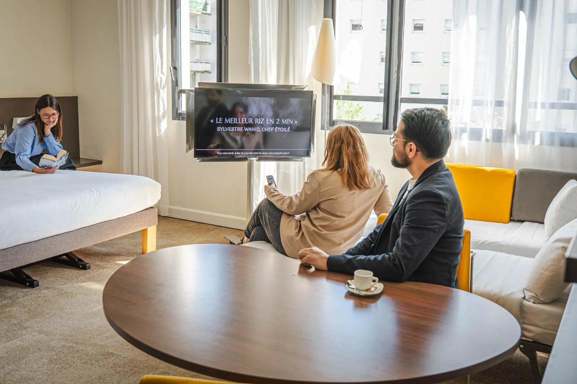 Communal lounge/ TV room in Novotel Suites Paris Montreuil Vincennes