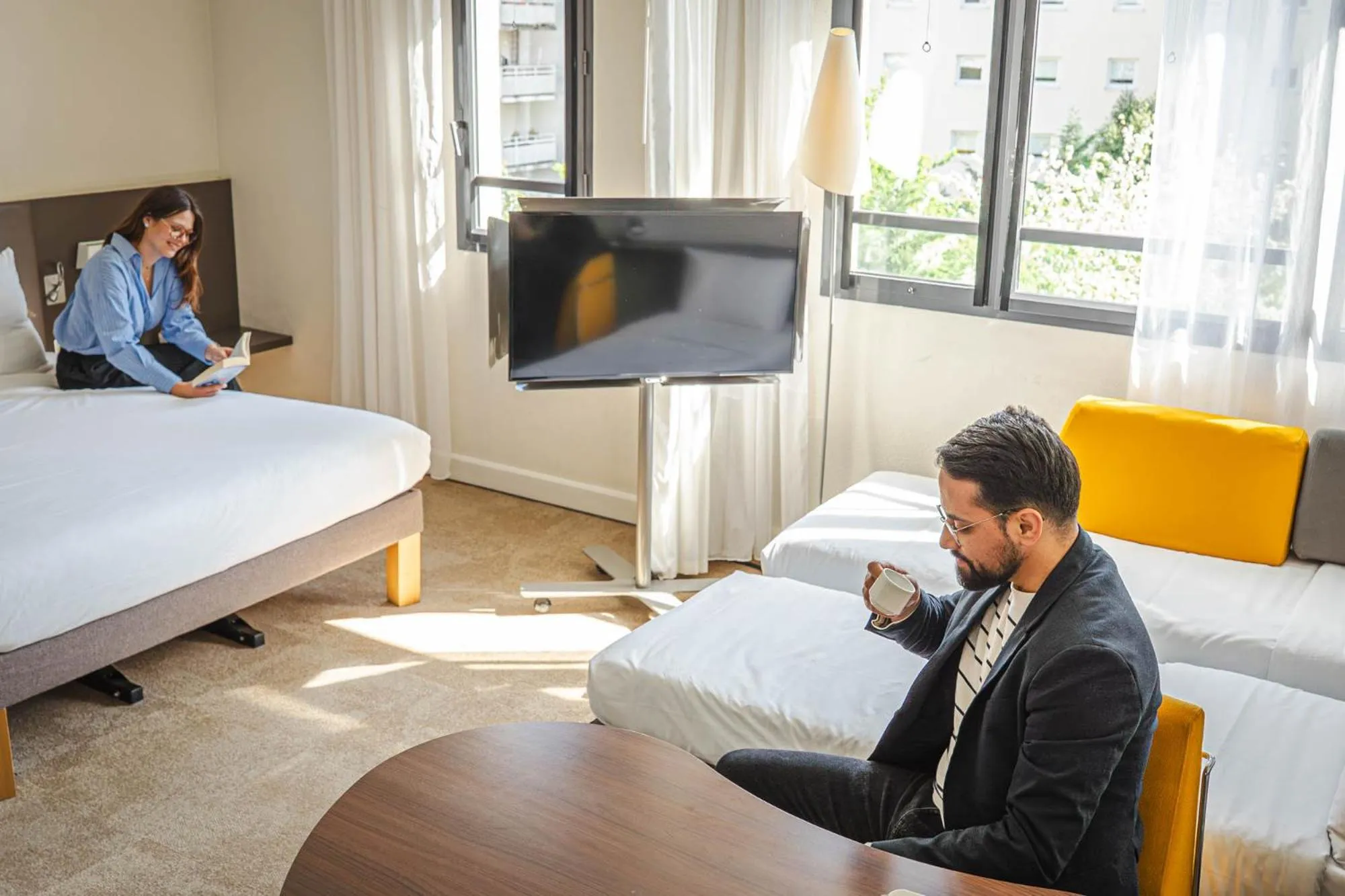 Bed in Novotel Suites Paris Montreuil Vincennes