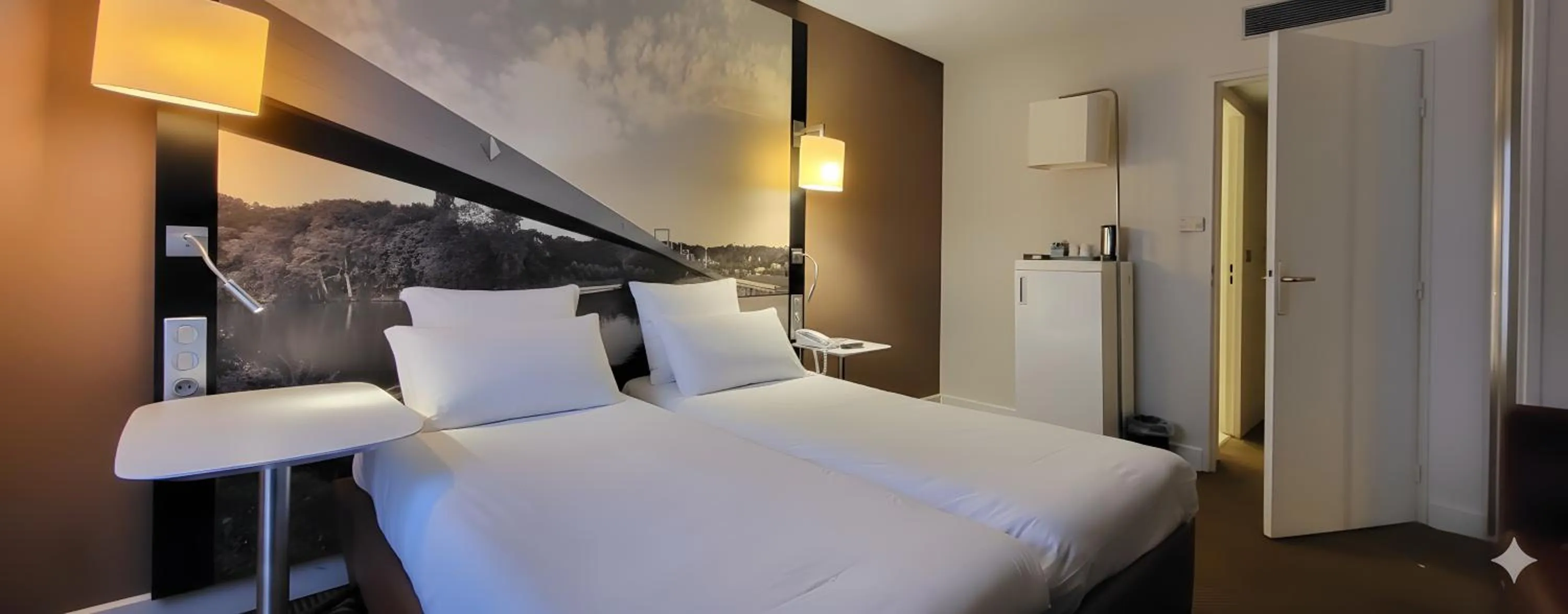 Bed in Mercure Cergy Pontoise Centre
