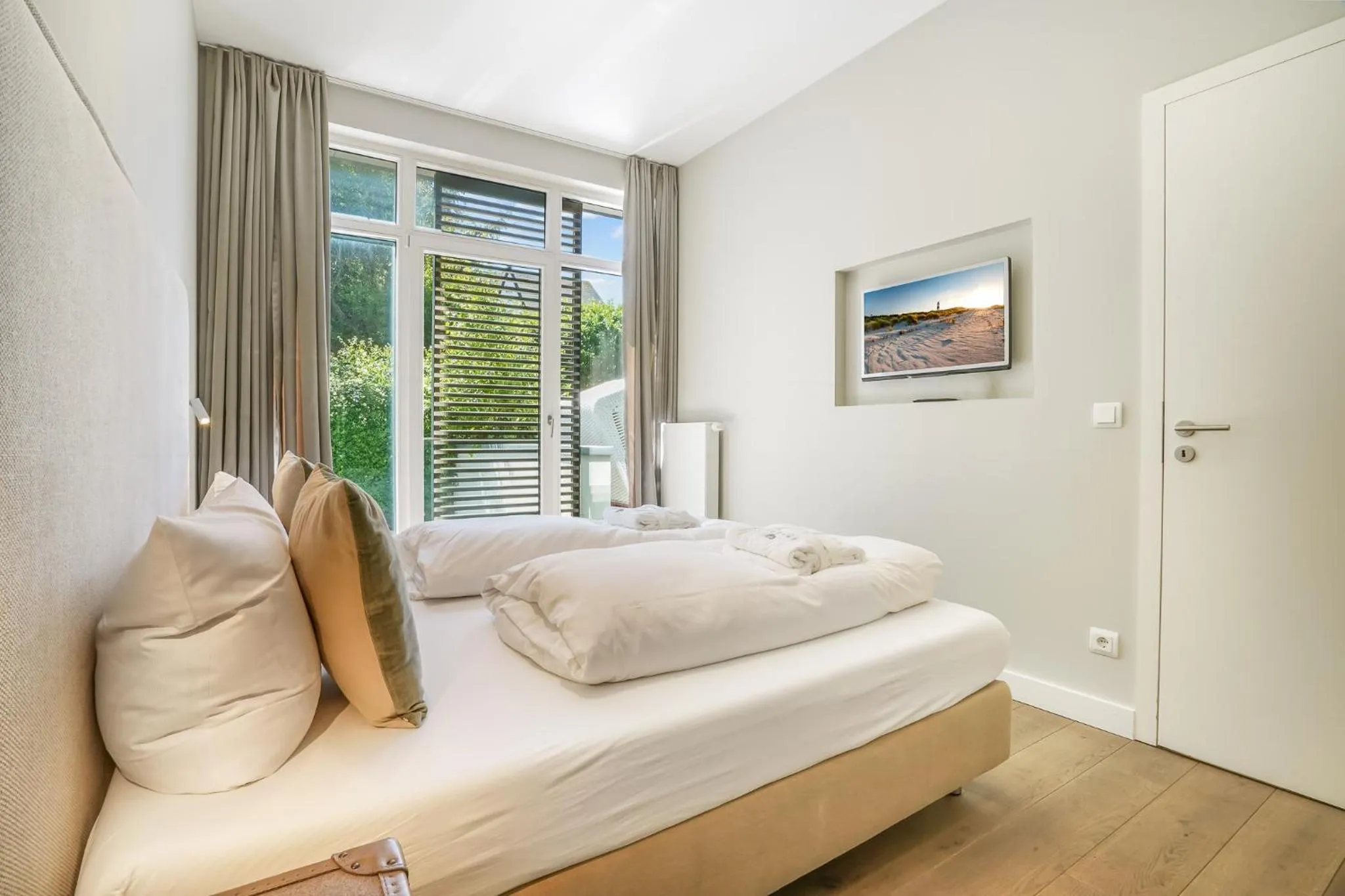 Bedroom, Bed in Das 54 Grad Nord - Apartments & More