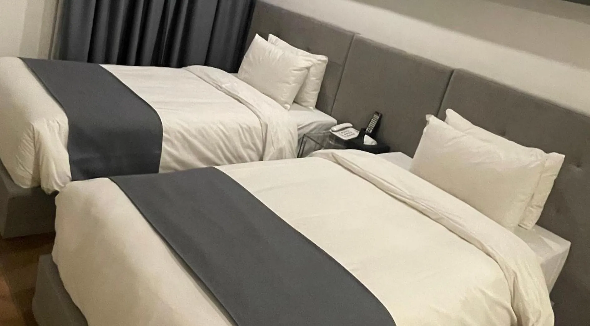 Bed in Hotel Noblestay