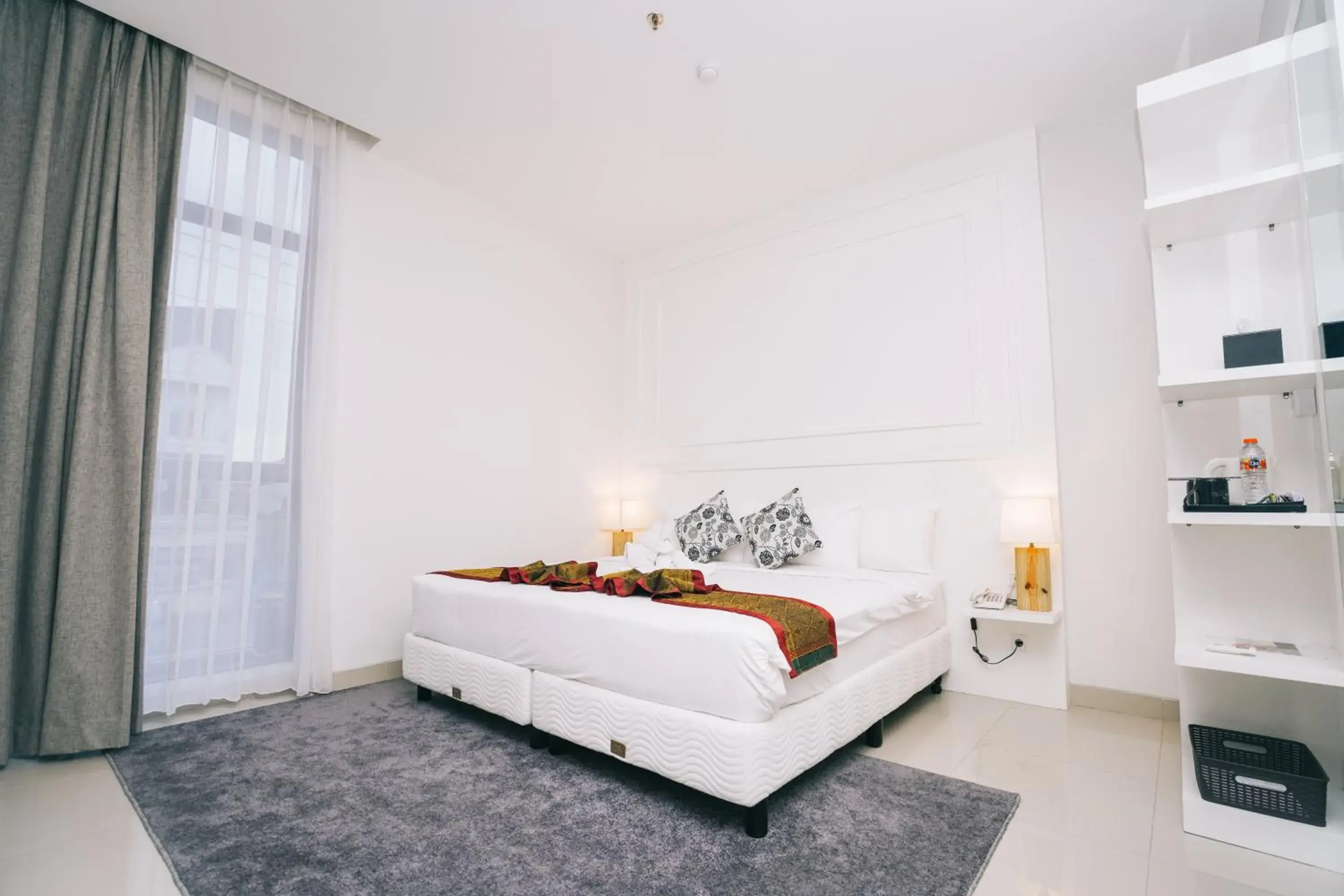 Bed in Alam Hotel by Cordela Bed in Alam Hotel by Cordela