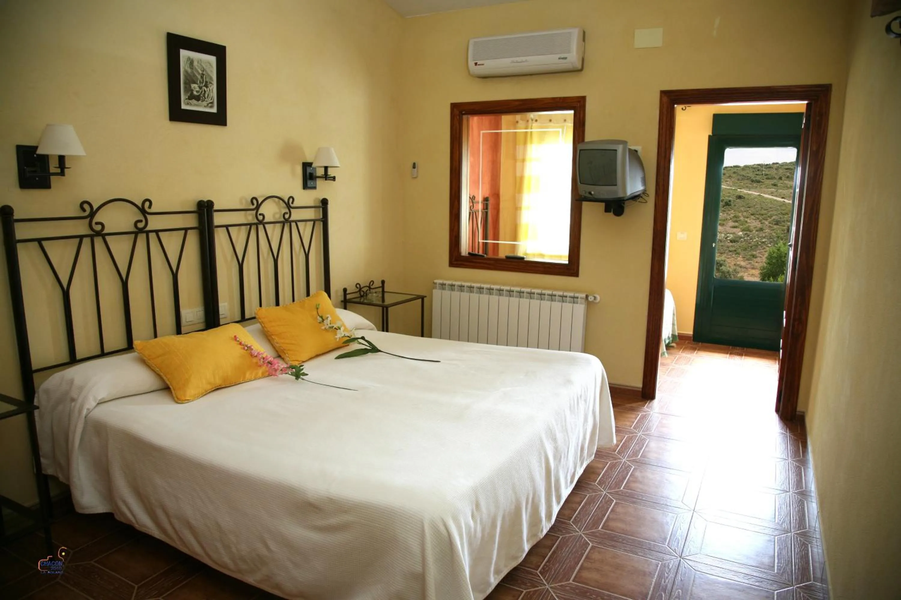Photo of the whole room, Bed in Apartamentos Los Panchos