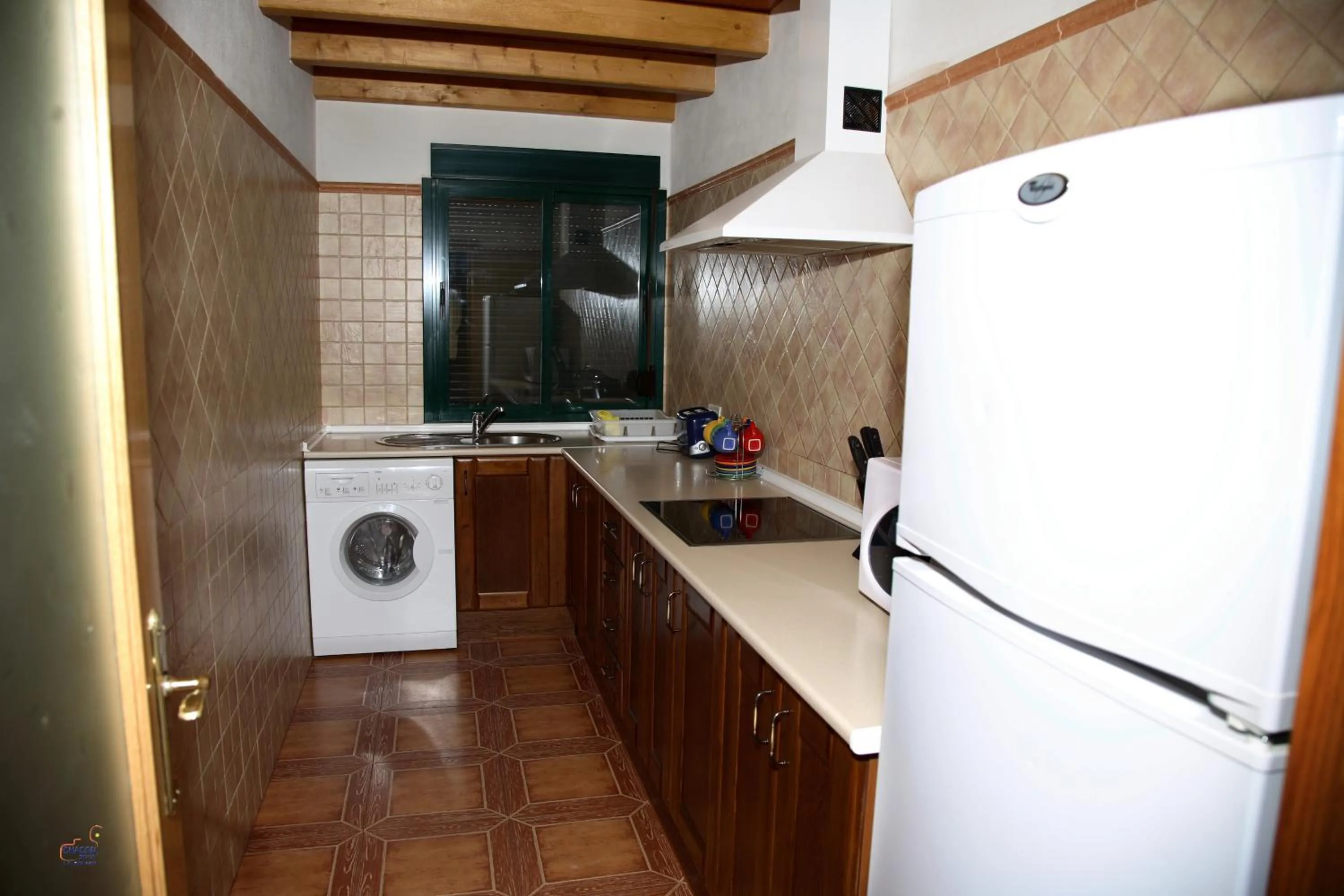 Kitchen or kitchenette in Apartamentos Los Panchos