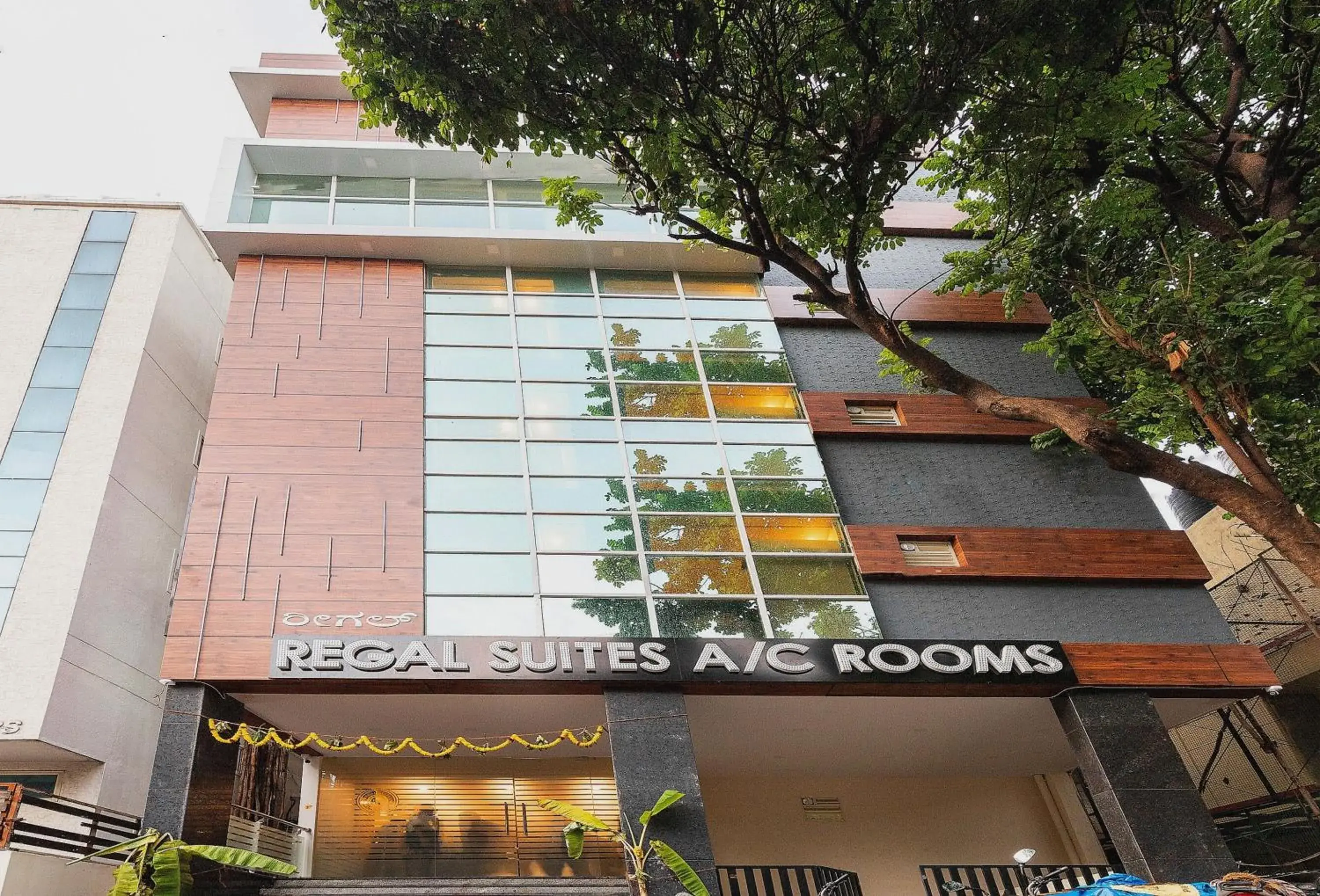 Facade/entrance in Capital O Regal suites Facade/entrance in Capital O Regal suites