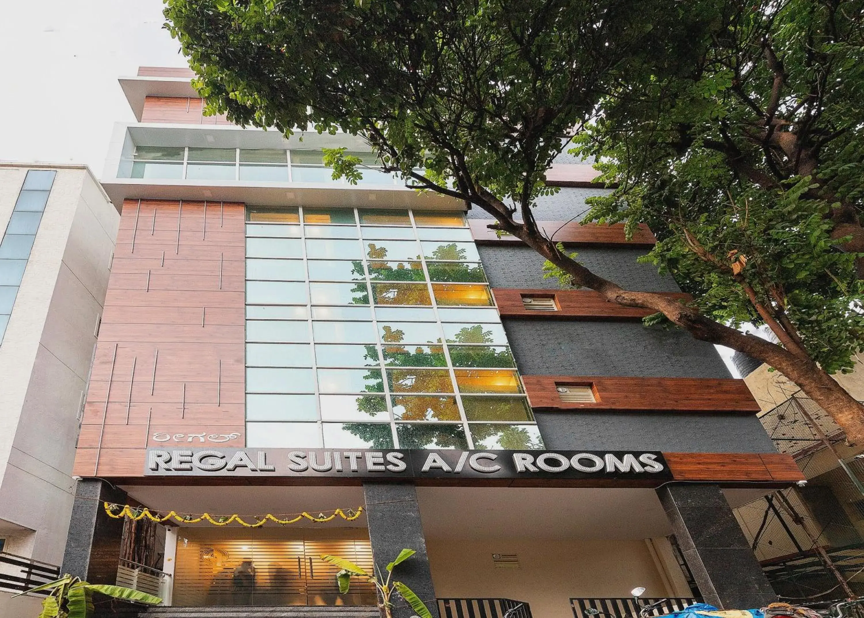 Facade/entrance in Capital O Regal suites Facade/entrance in Capital O Regal suites